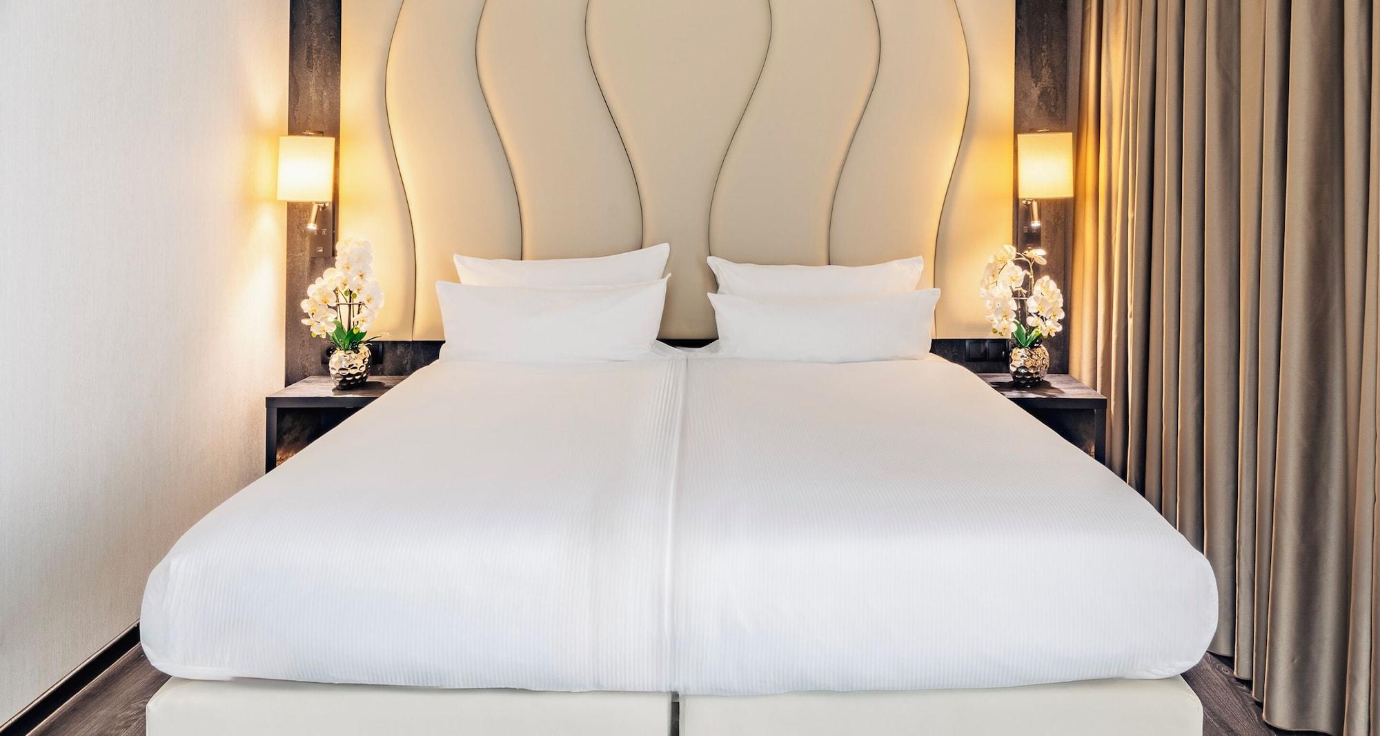 Habitación PLAZA Premium Grand Winston