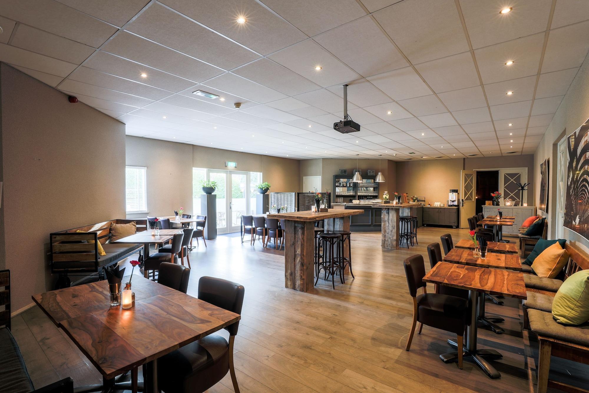 Bar/Salón Fletcher Hotel - Restaurant De Reiskoffer