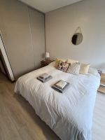 Alquiler Vacacional - Moderno departamento con cochera y seguridad