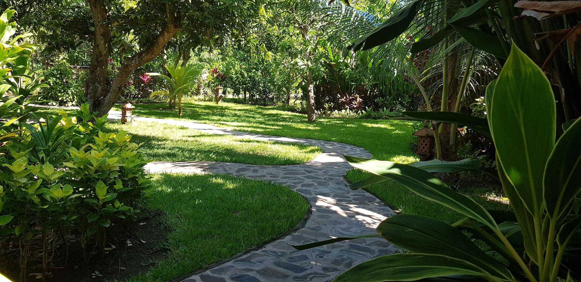 Vista da fachada Mango Tree Inn