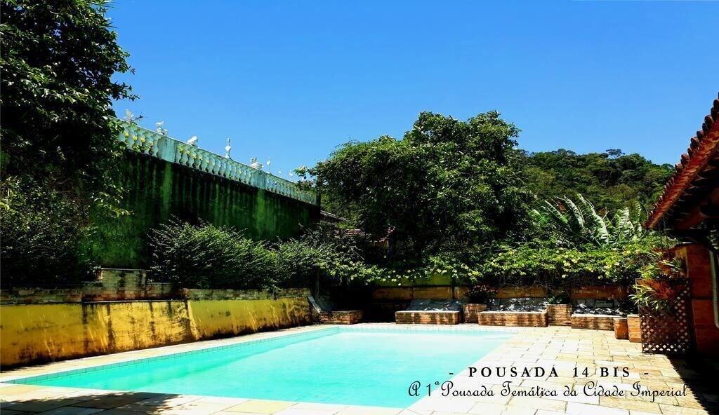 Vista da piscina Pousada 14 Bis