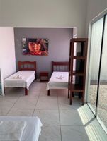 Alquiler Vacacional - Casa com Piscina e Jardim, a 400m da Praia de águas quente. Aceita seu animal.