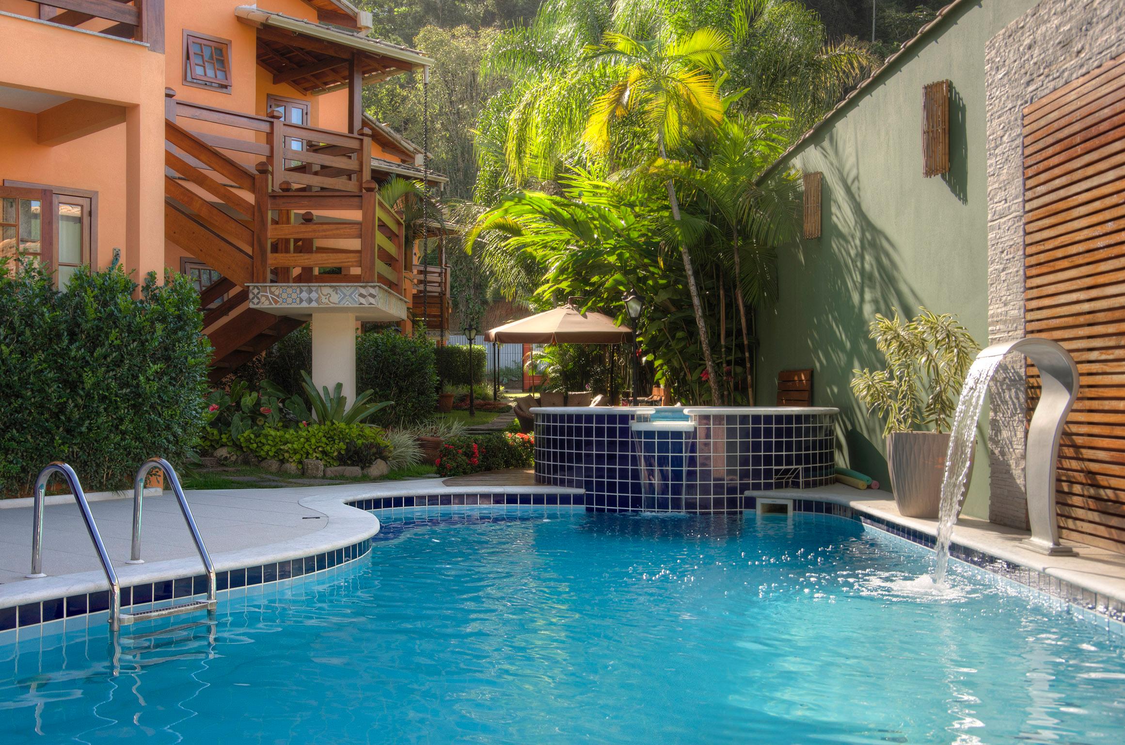Vista da piscina Refúgio Tropical Pousada & Flats