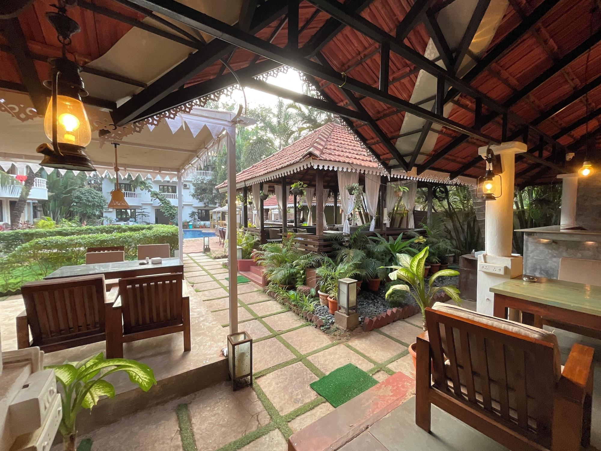 Bar/Salón Naga Cottages x One Light Stays