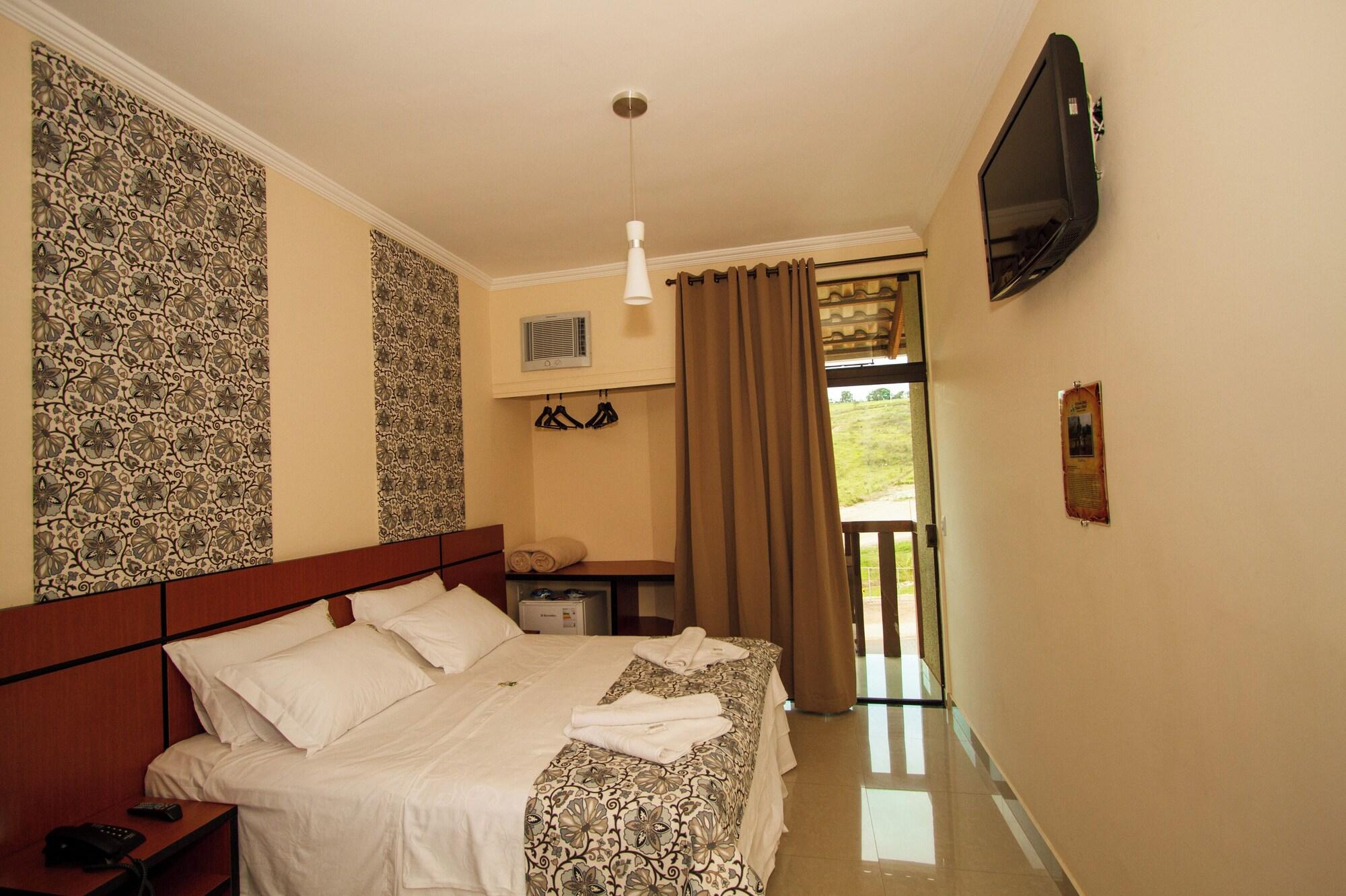 Habitación Estrada Real Palace Hotel