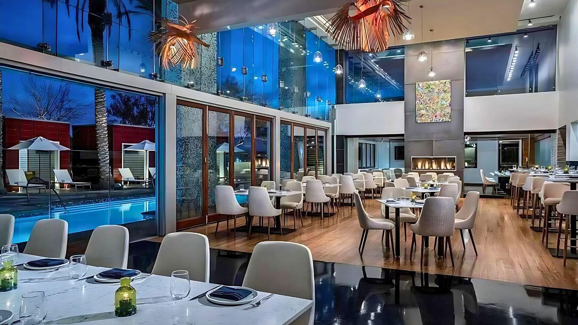 Restaurant One Bedroom | 1.5 Baths & Living Room | Jet Tub – Palms Place StripSuite