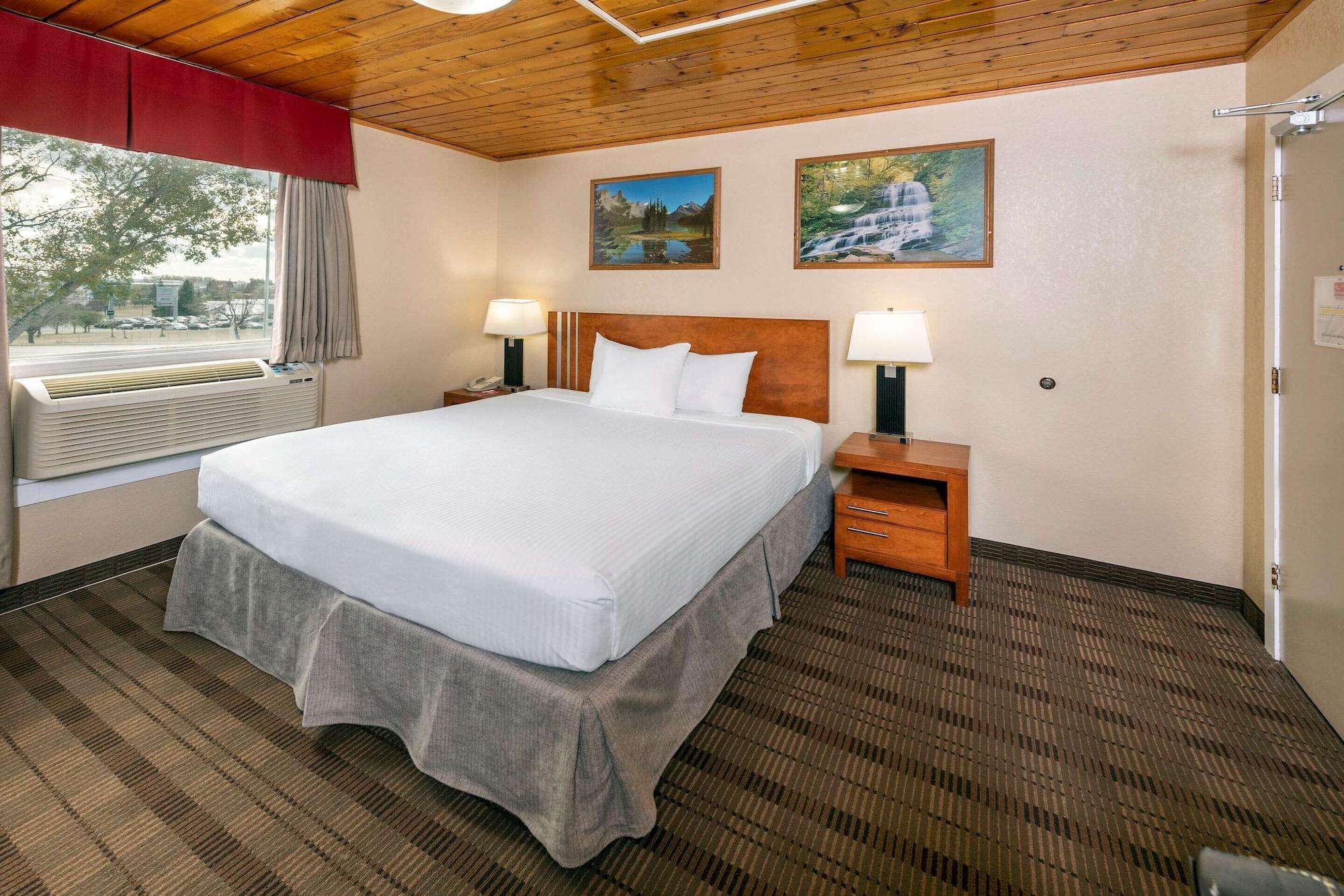 Habitación Econo Lodge Inn & Suites