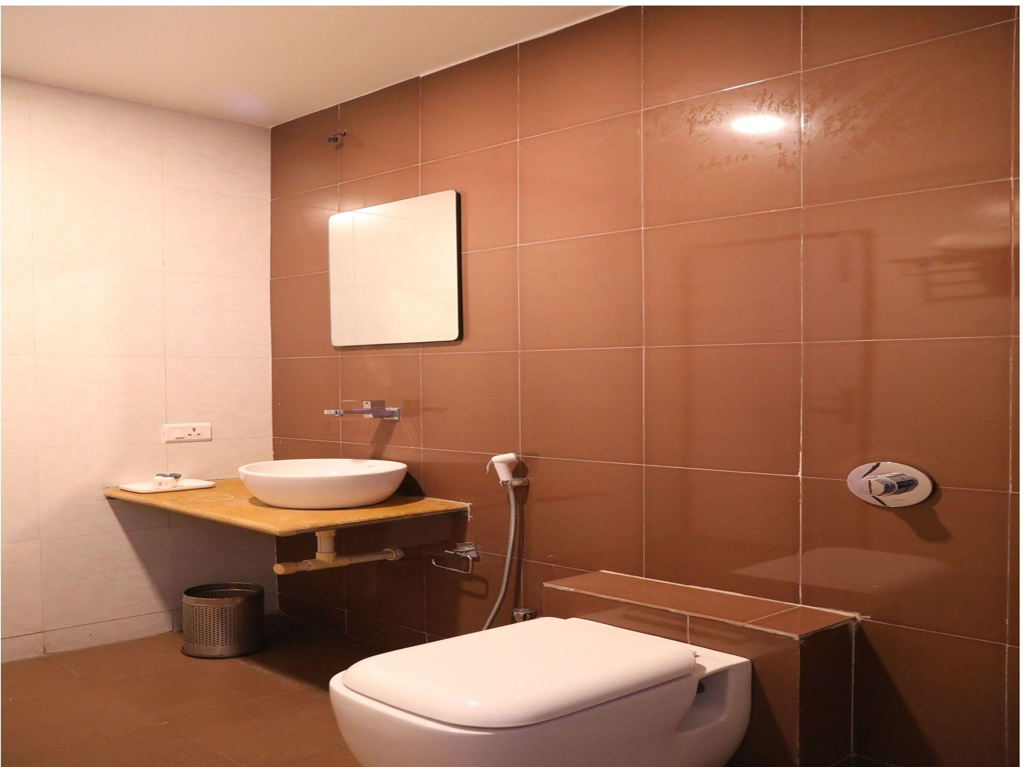 Comodidades do quarto OYO 11889 White Hall