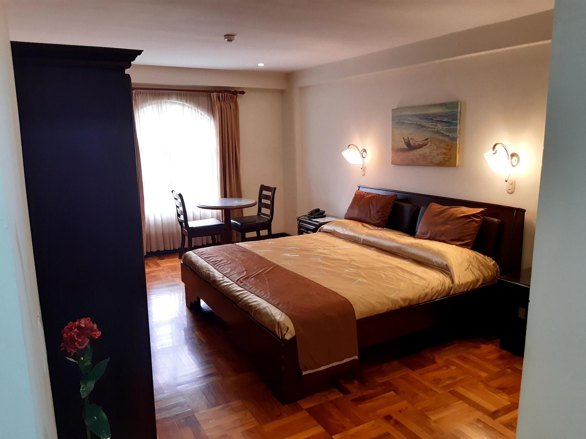 Quarto Hotel Plaza Real