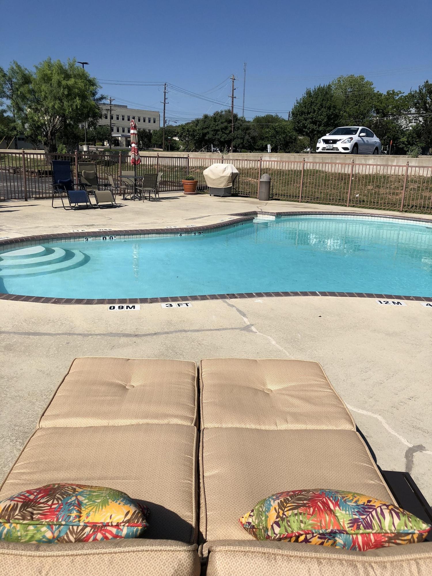 Vista Piscina Windcrest Inn and Suites
