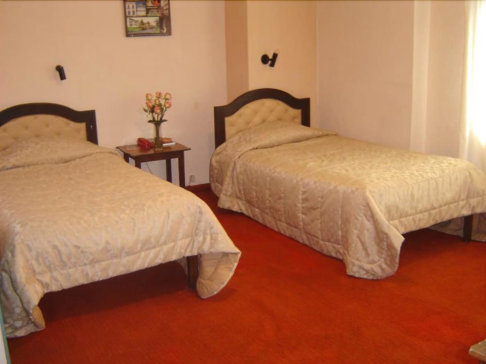 Habitación Hotel Tomebamba