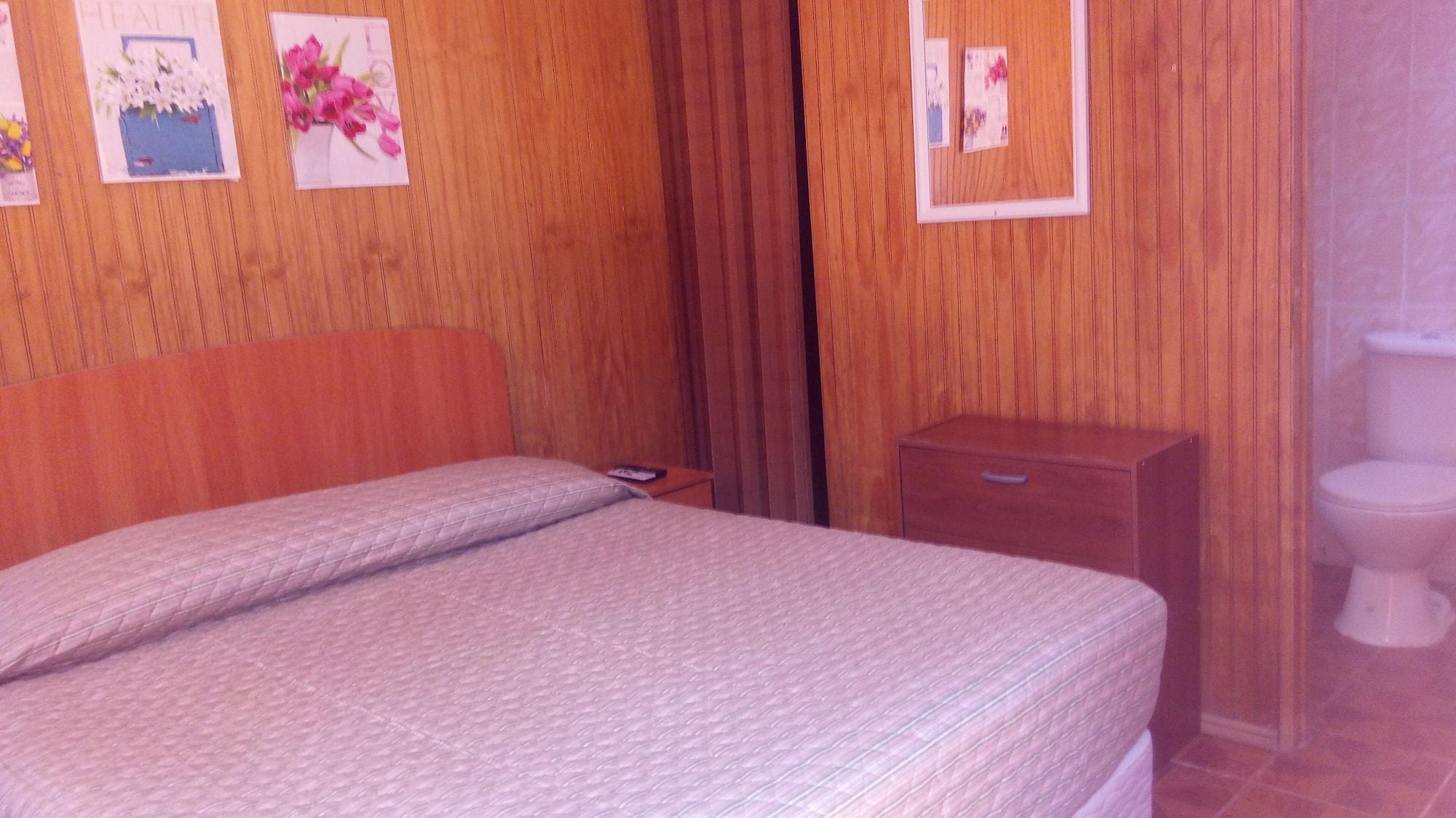 Habitación Hotel Amigos