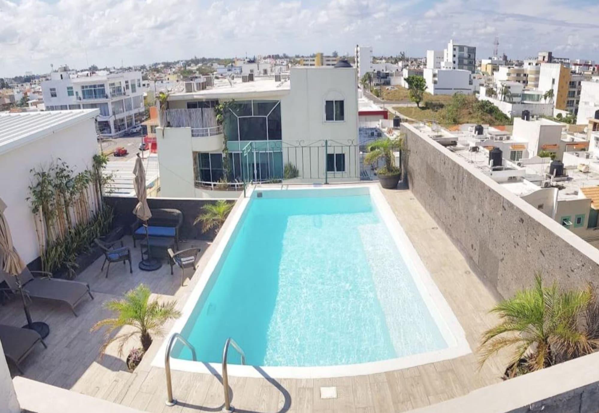 Varios Boca Inn Hotel & Suites