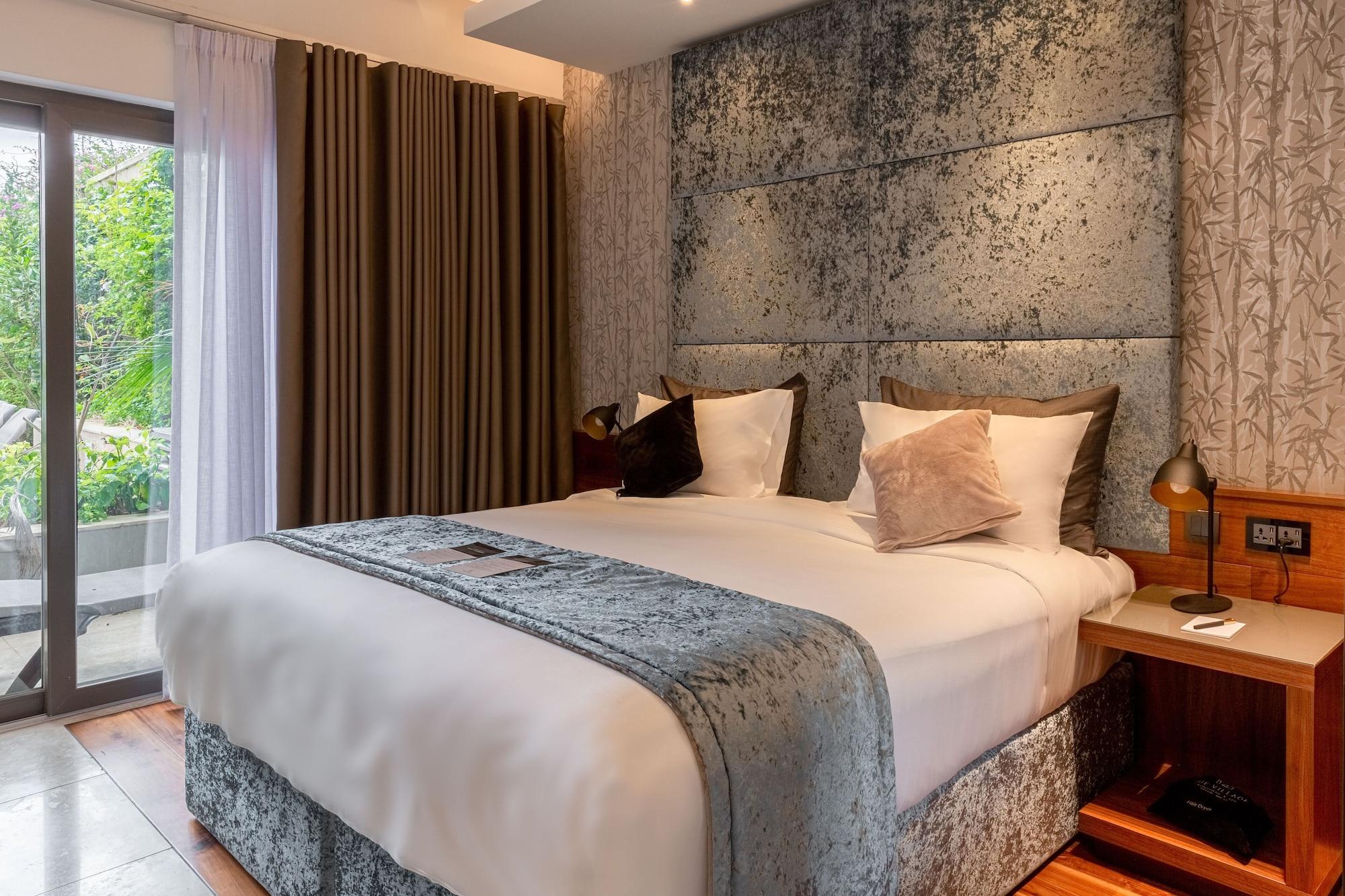 Habitación The Village Boutique & Spa