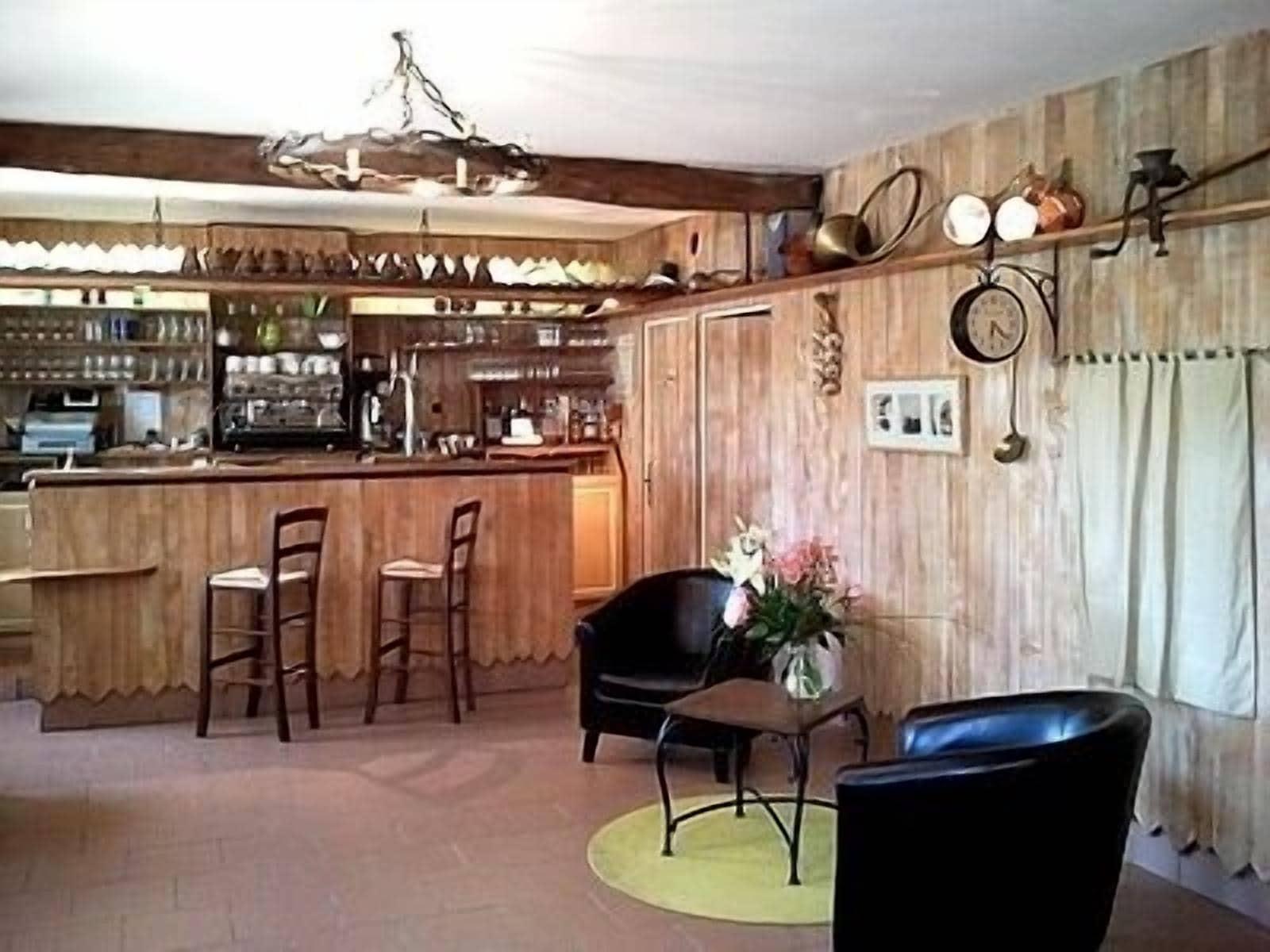 Bar/Salón L'Auberge de Larressingle