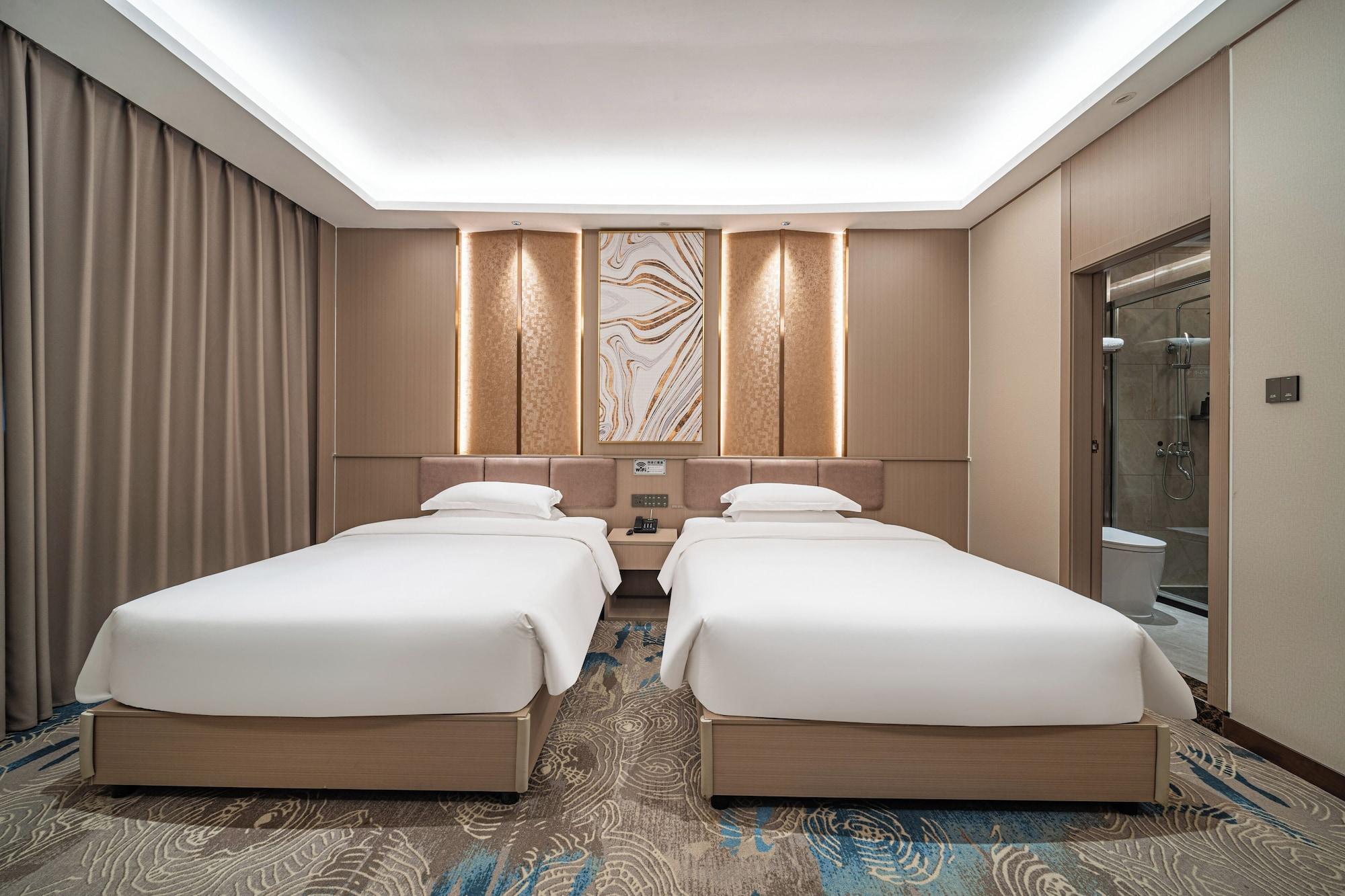 Habitación ELONG DELUXE International Hotel