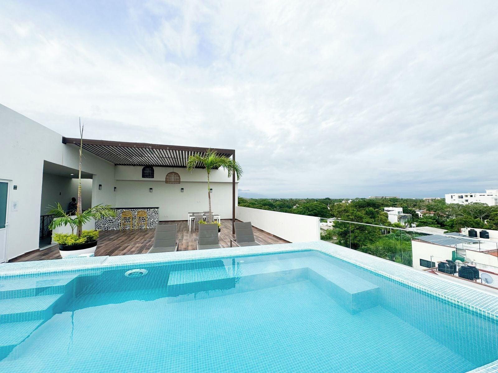 Vista Piscina Edificio ONE