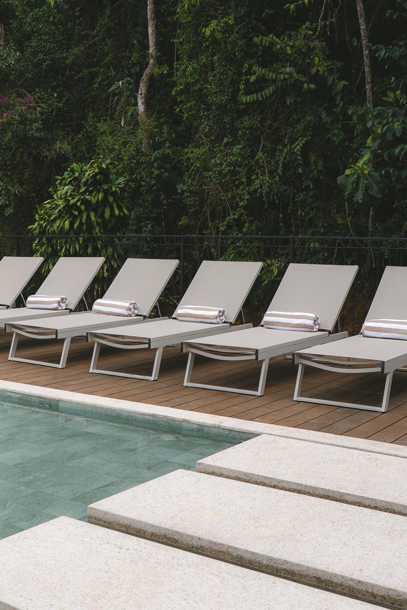 Vista da piscina Casa Ita Hotel