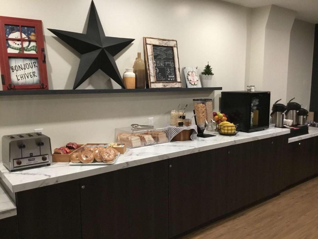 Restaurant Villa Inn & Suites, SureStay Collection by Best We