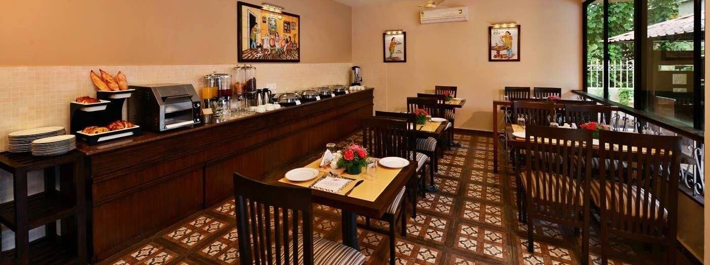 Restaurant La Sunila Suites & Villas by WSI