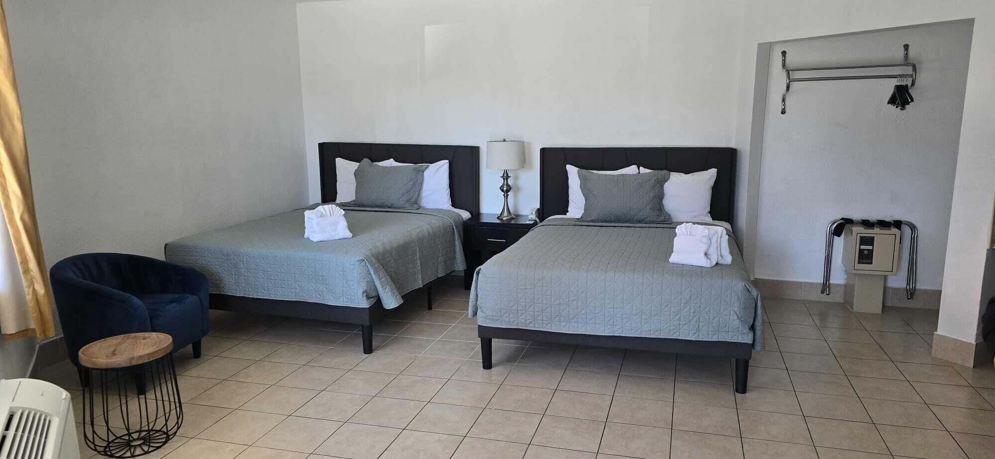 Habitación Travelsuites Inn