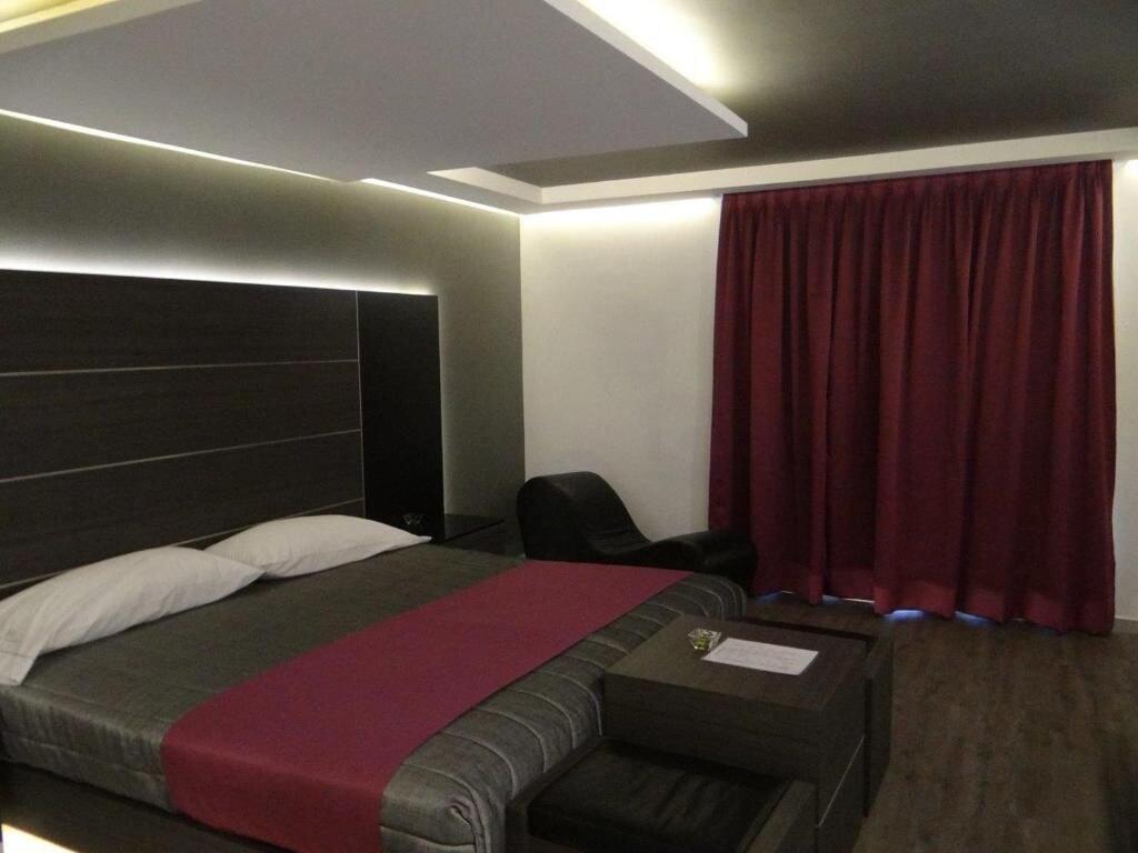 Quarto Hotel Boutique H
