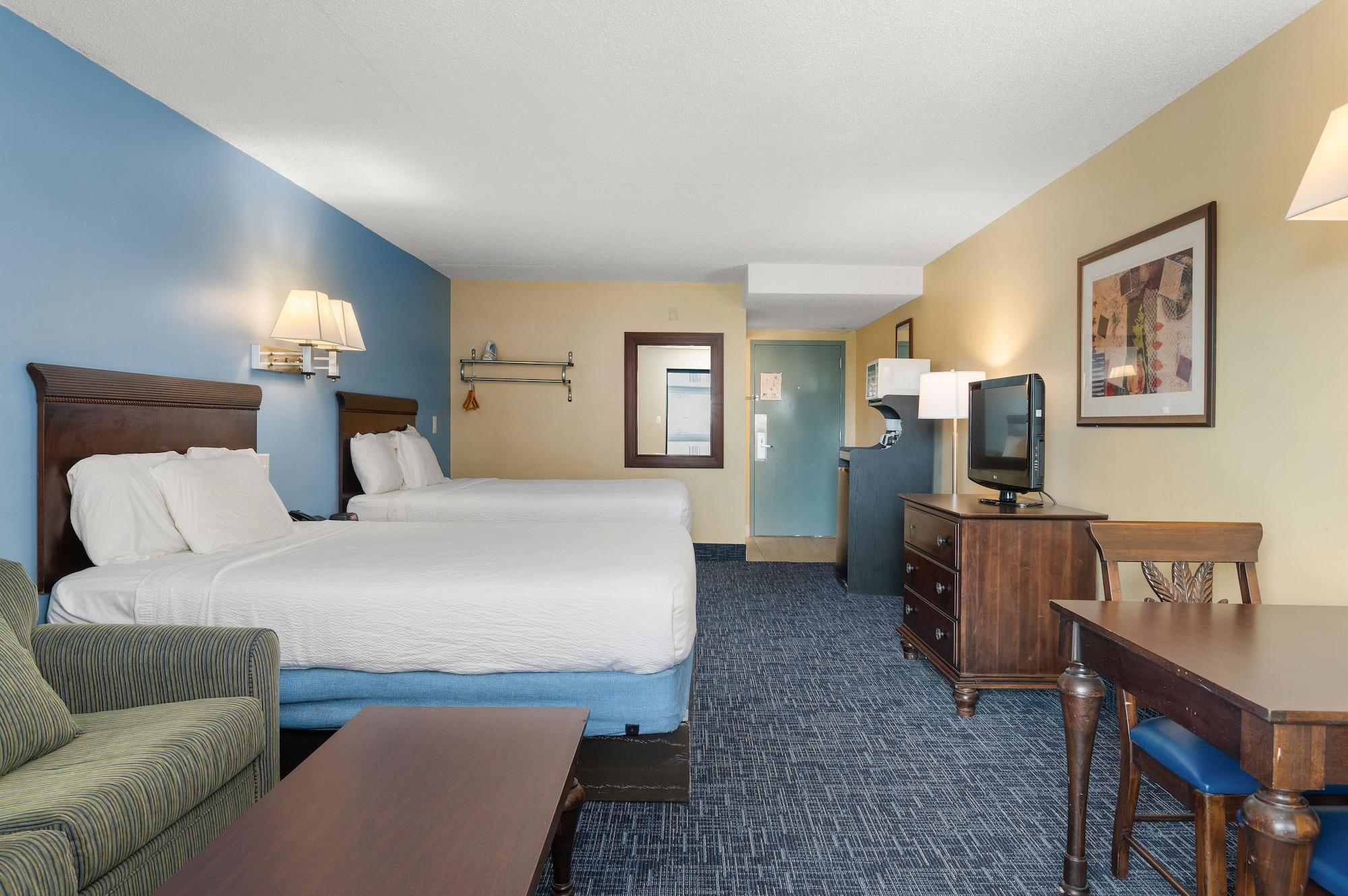 Habitación Coastal Palms Inn & Suites