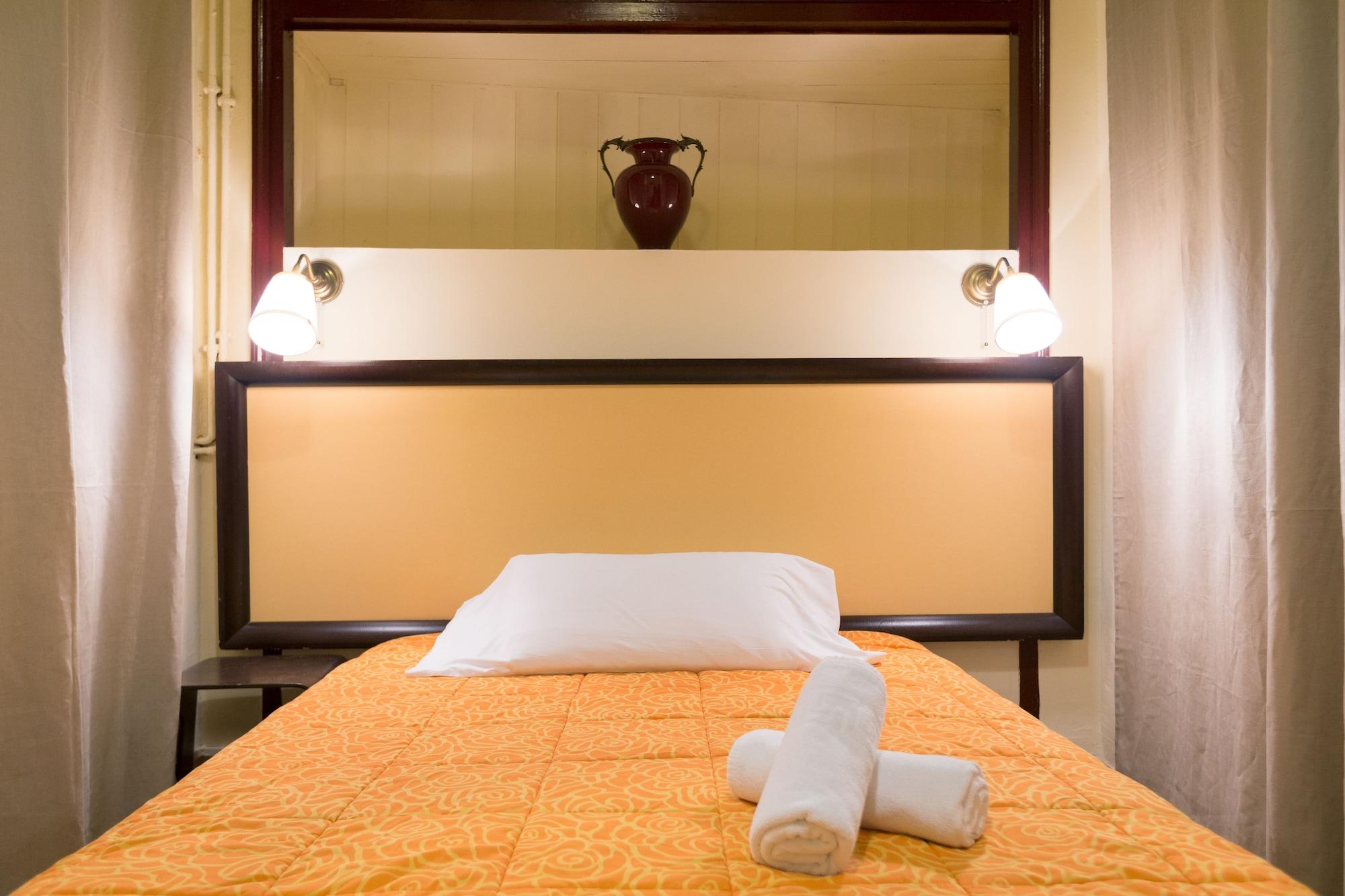 Habitación Pension Nuevo Suizo