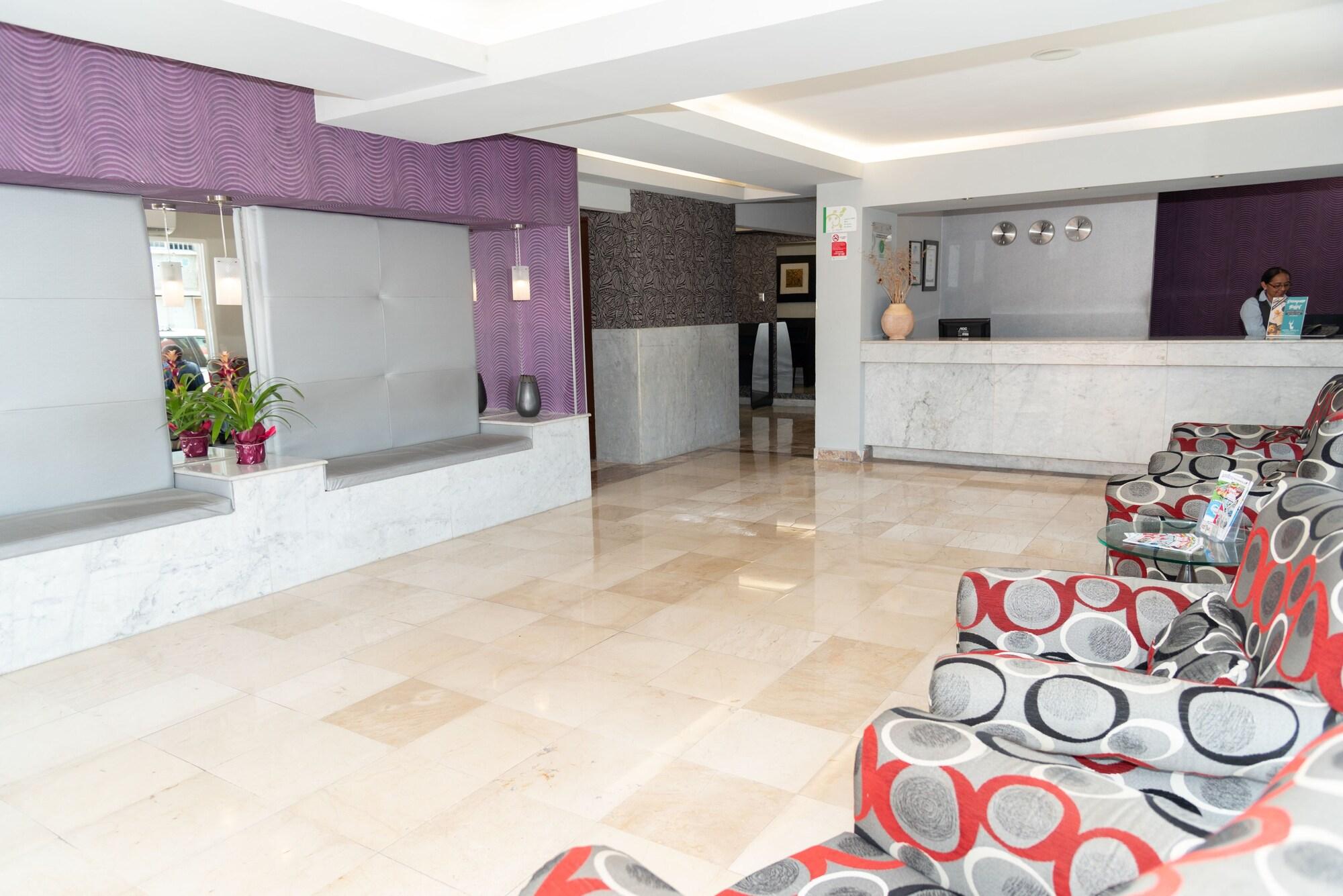 Vista Lobby Impala Hotel in front of the ADO