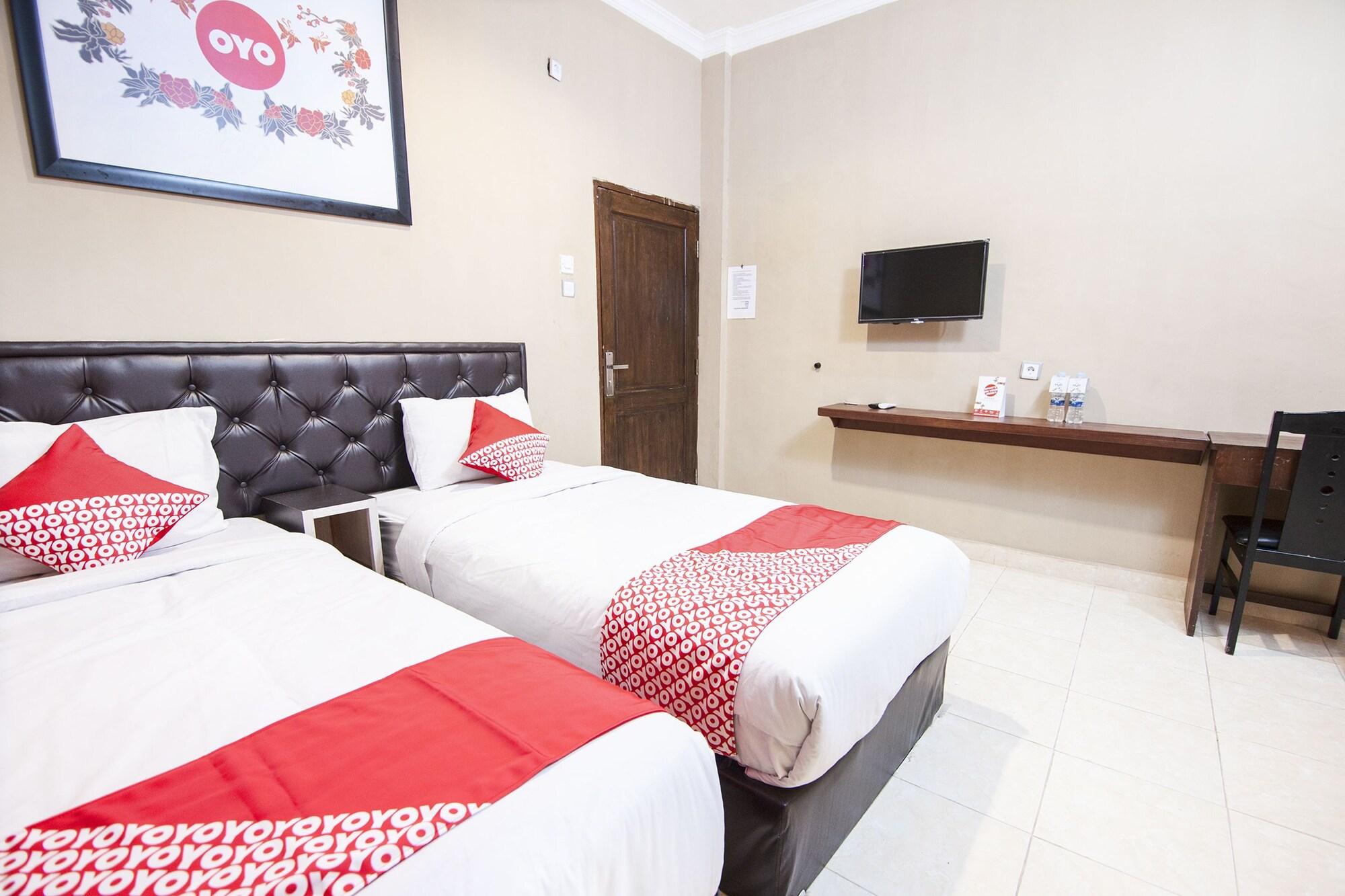 Habitación OYO 519 Coin Mulia Hotel