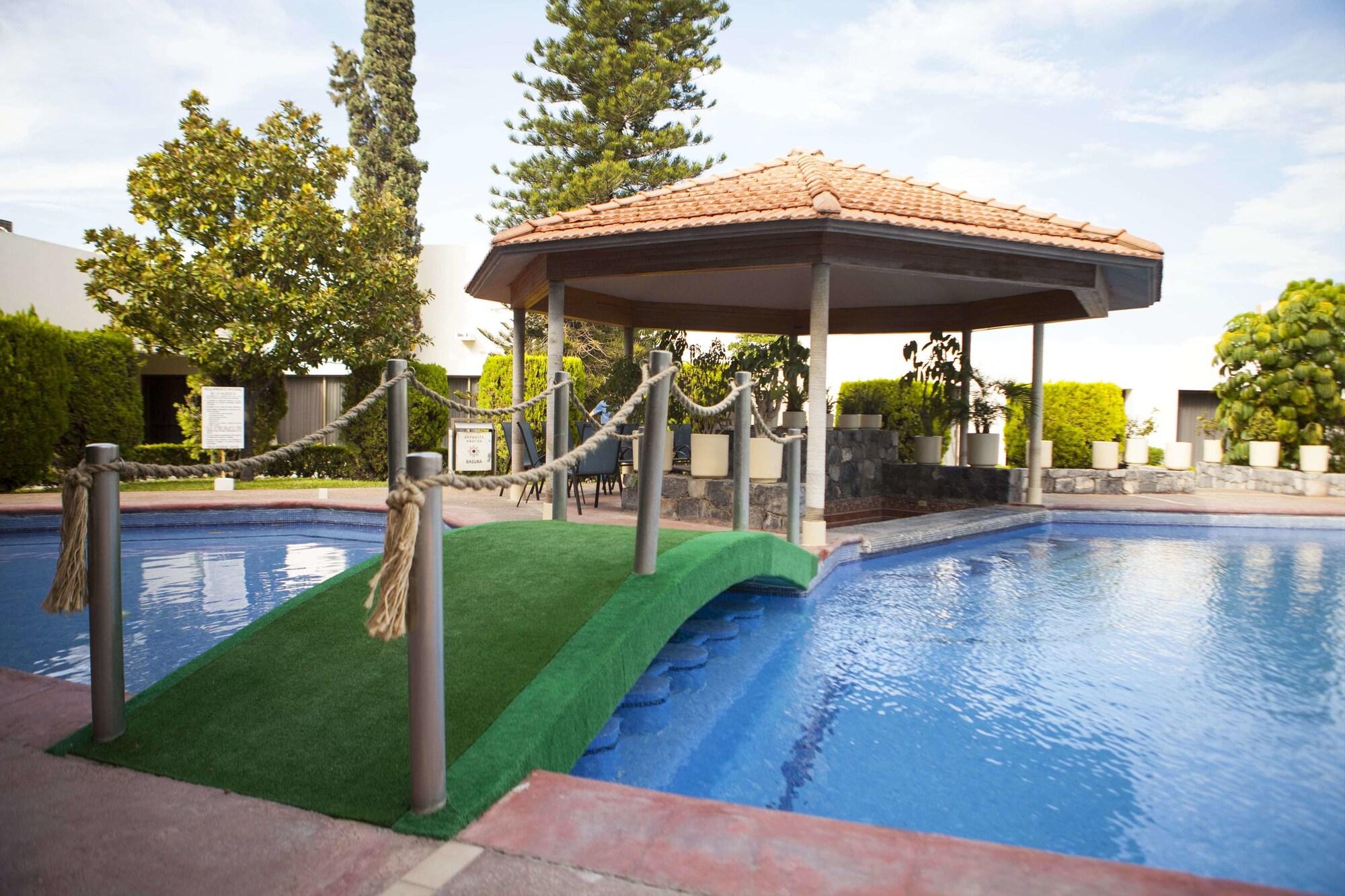 Vista Piscina Hotel Paradise Inn