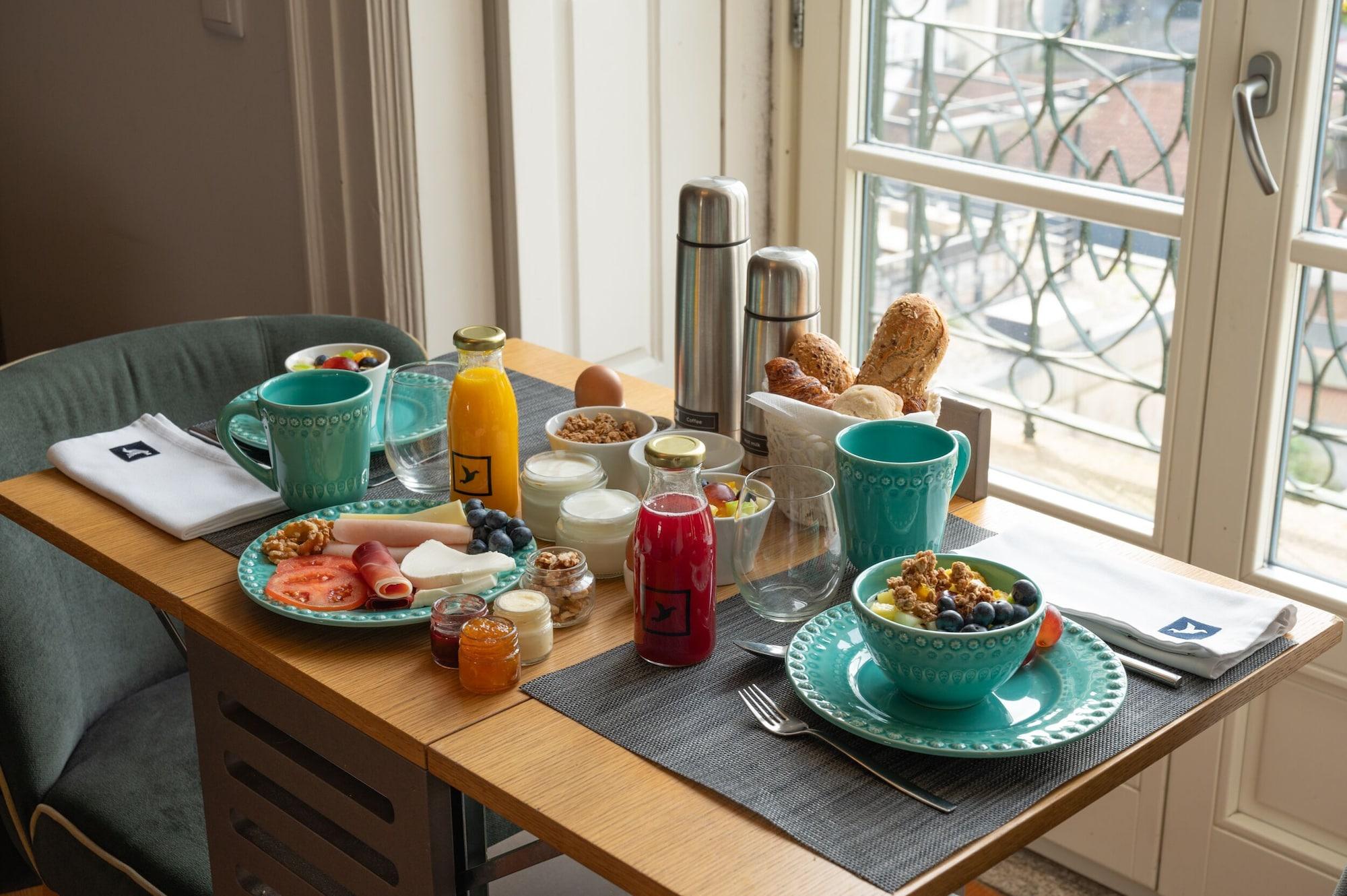 Comodidades do quarto Santa Catarina FLH Suites