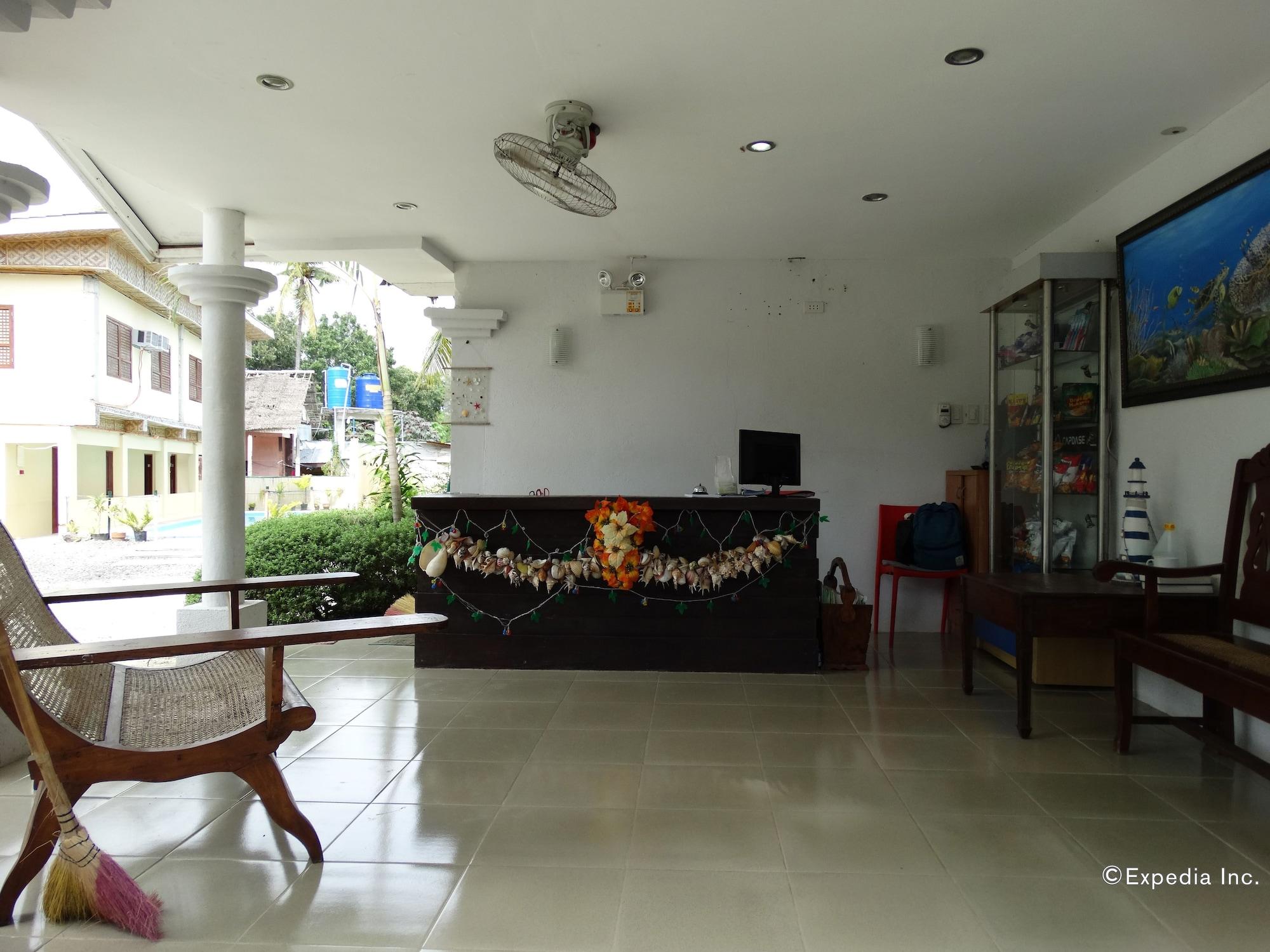 Vista Lobby Whites and Greens Beach Resort