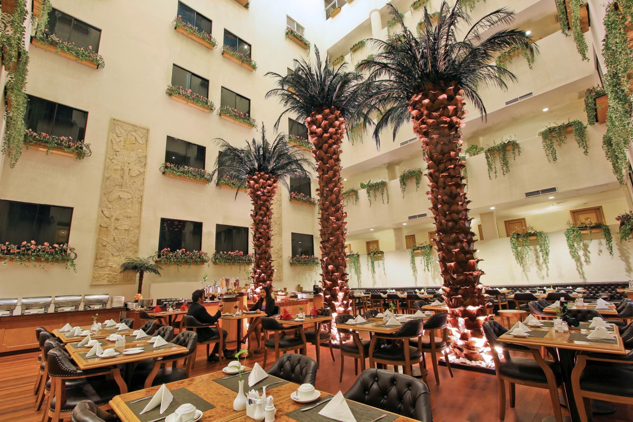 Restaurant Harmoni Suites Hotel