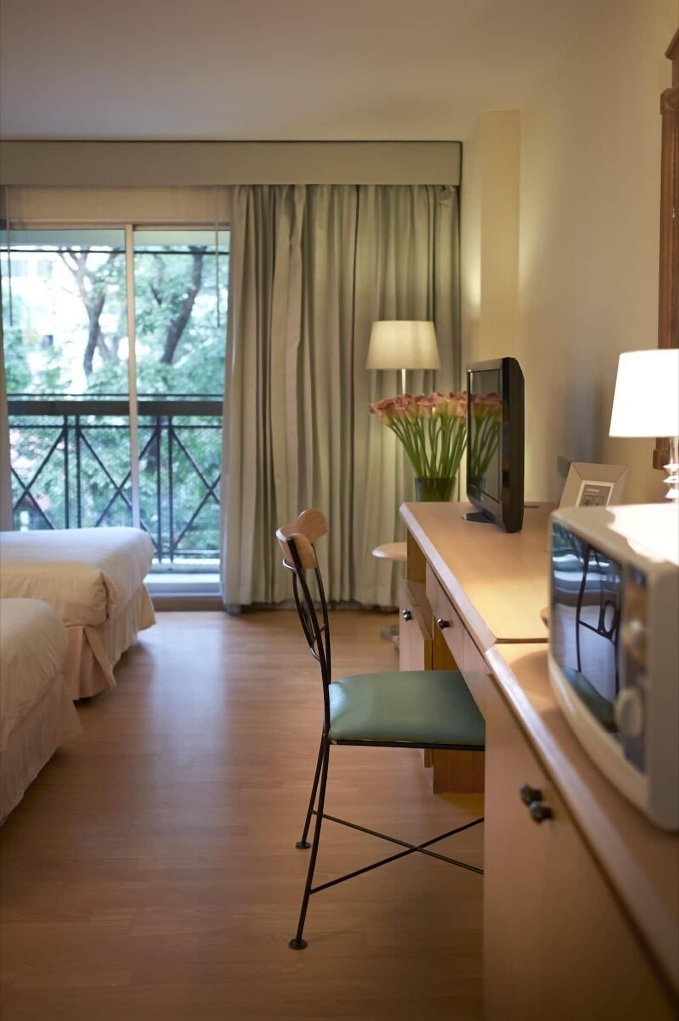 Habitación Ravipha Residences