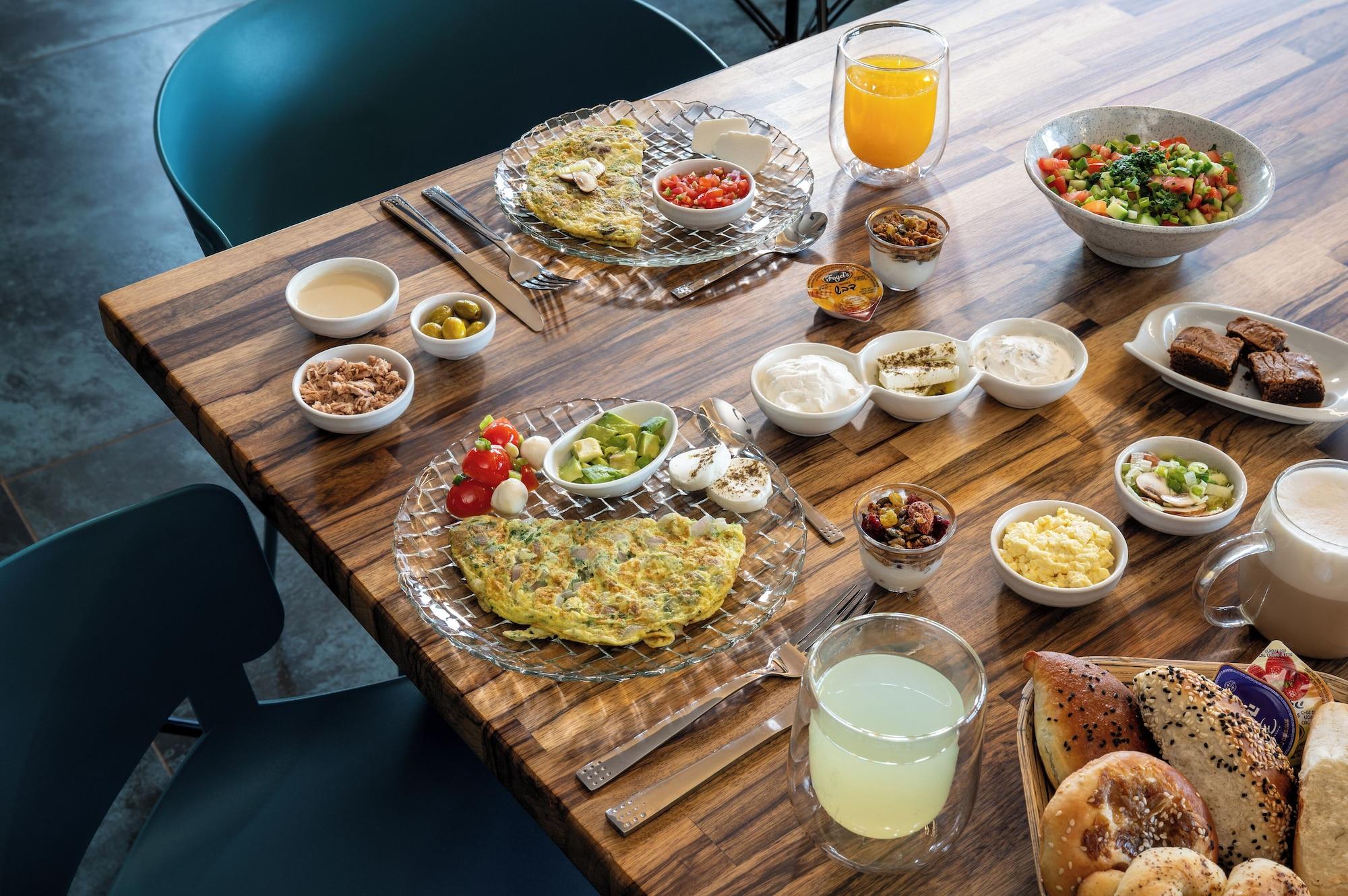 Restaurant Naomi Boutique Suites