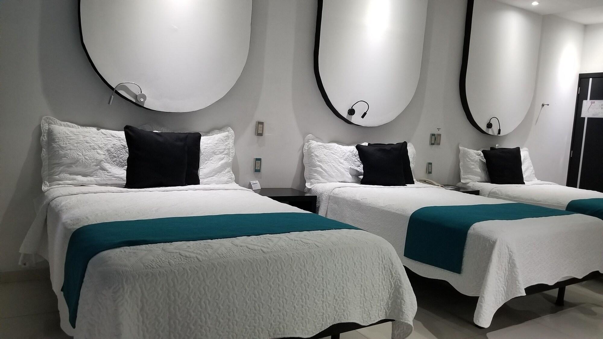 Habitación Hotel Dluxe & Suites