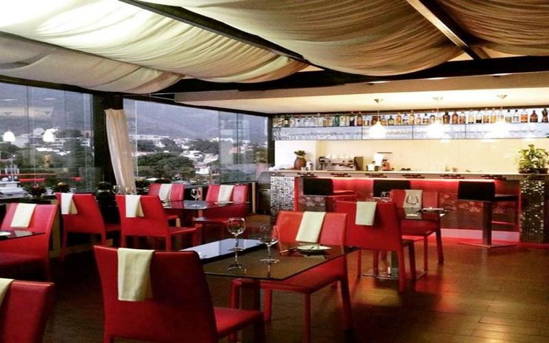 Bar/Salón Altamira Village Hotel & Suites