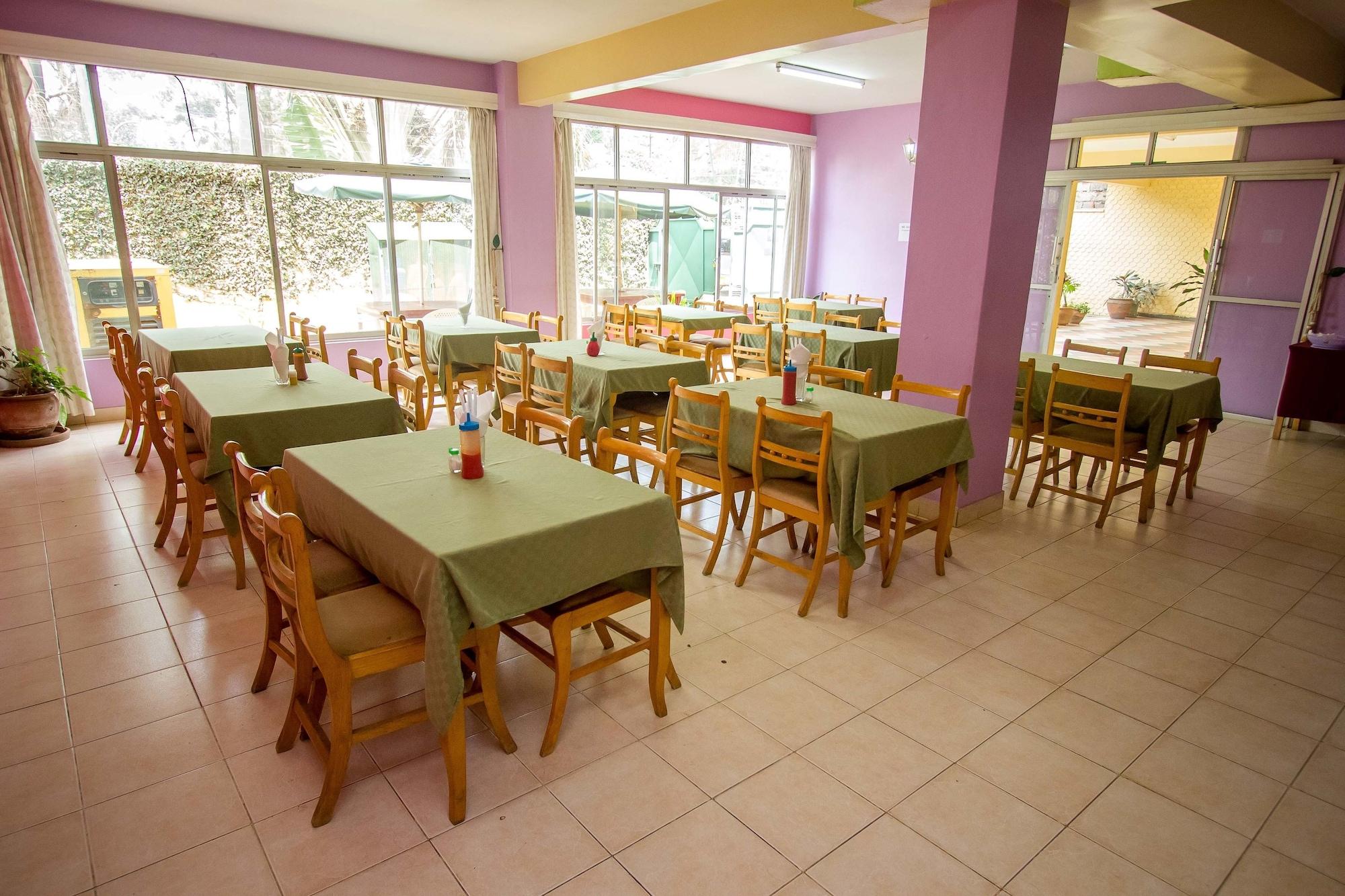 Restaurant Harlequin Suites Hotel
