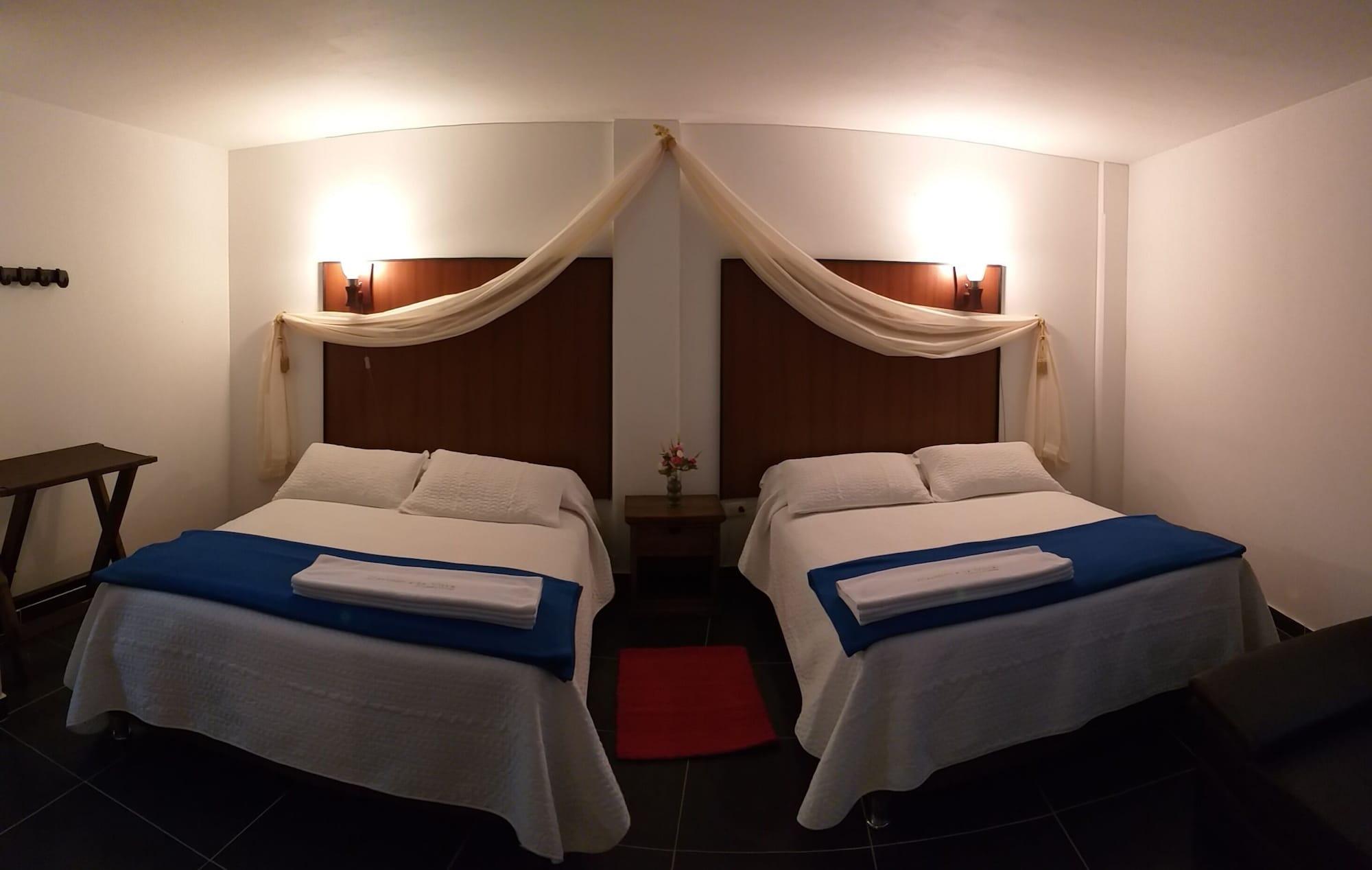 Habitación Camino a la Villa Cucaita Hotel