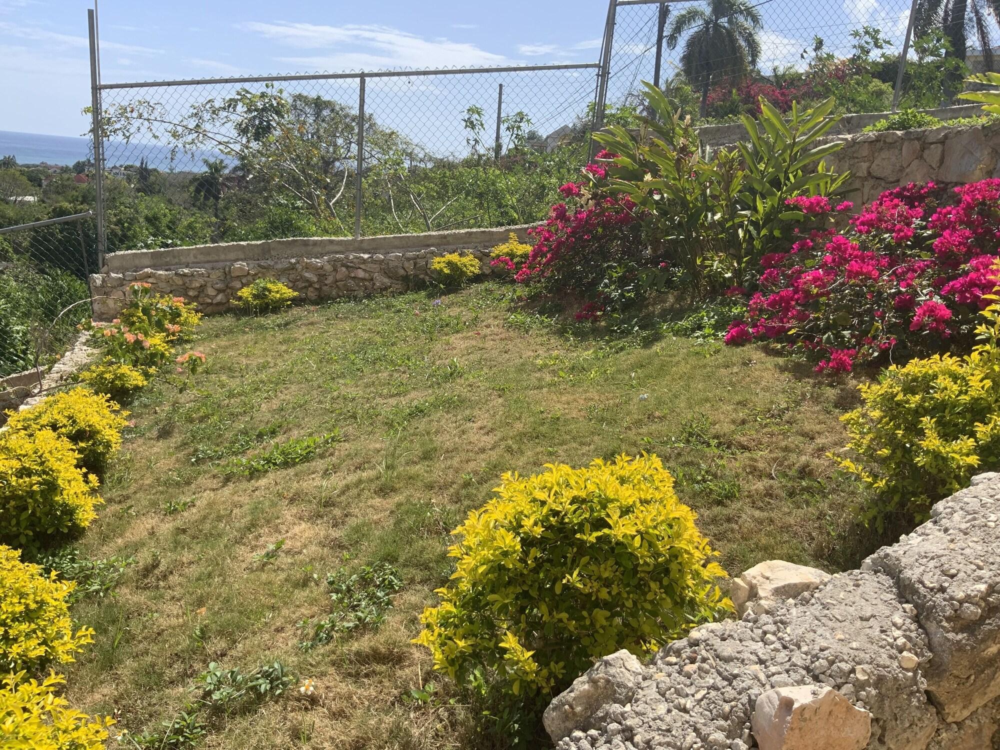 Varios Poinciana House