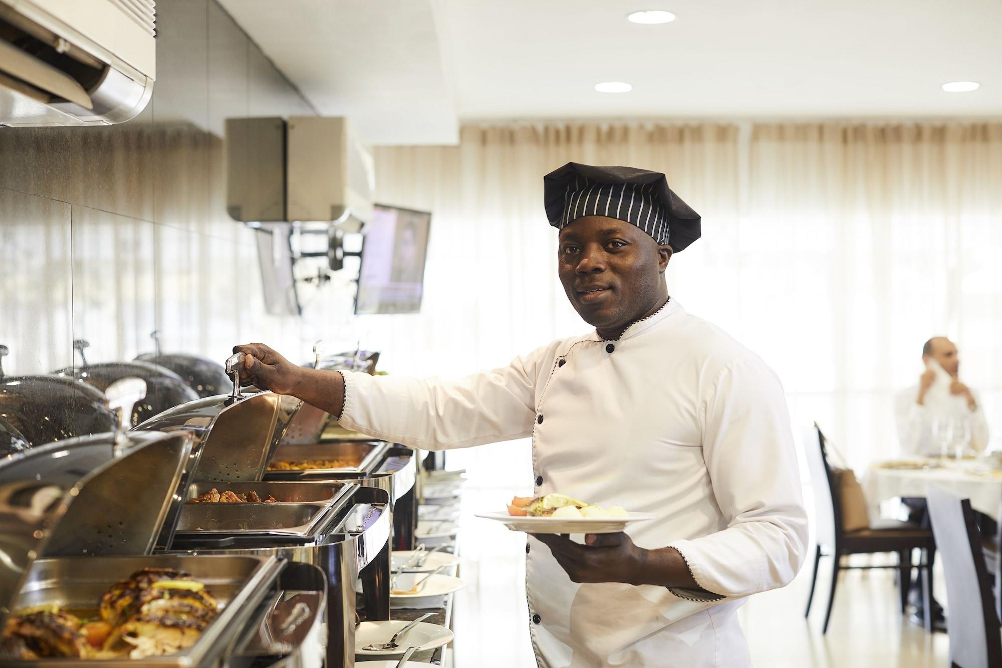 Restaurant RK Suite Hotel