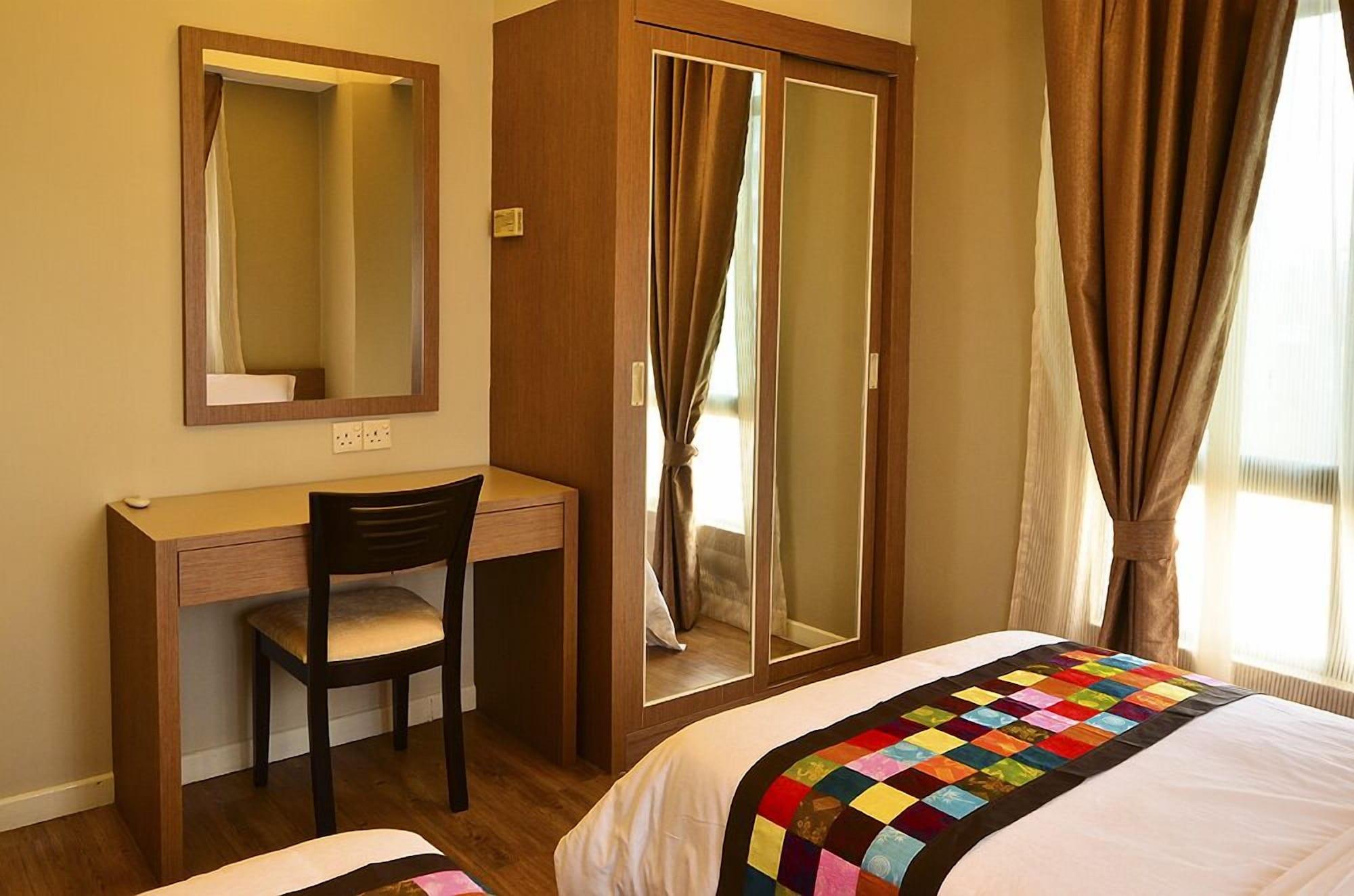 Habitación Jetty Suites Apartments