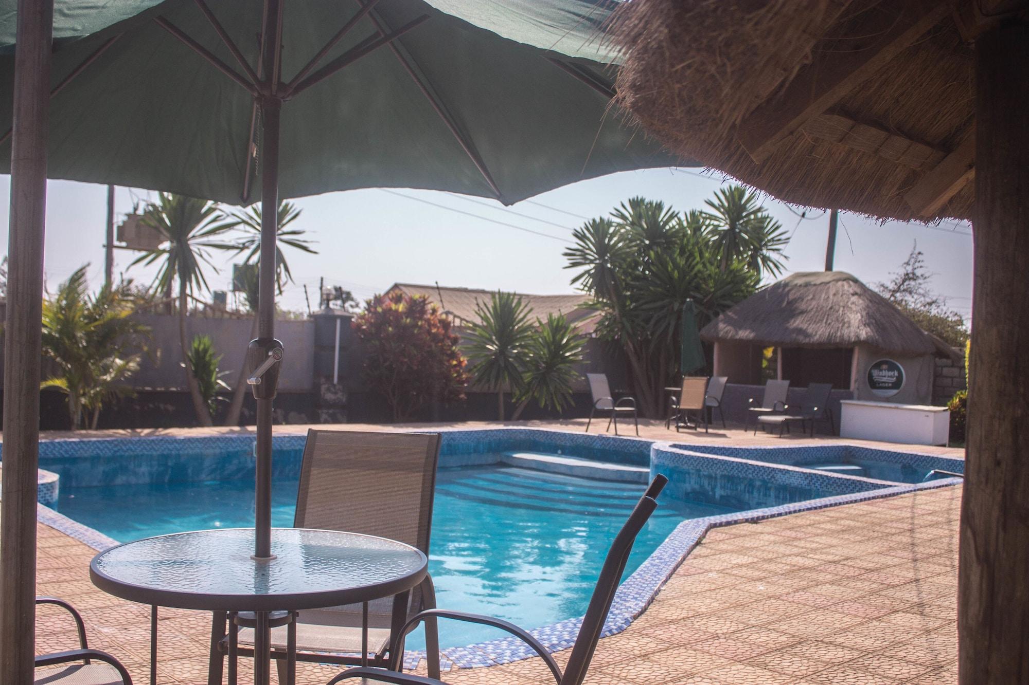 Vista Piscina Leget Lodges & Gardens