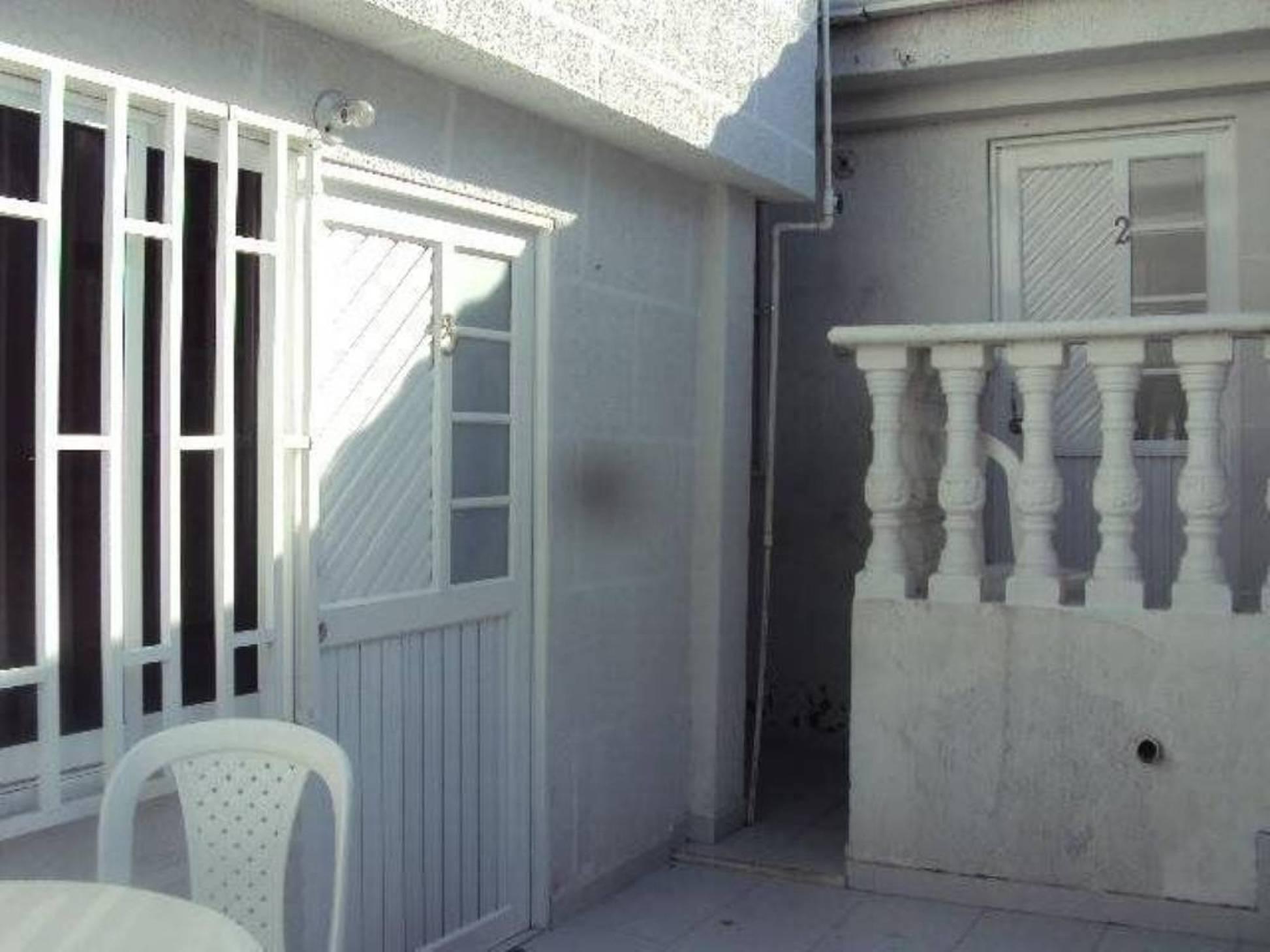 Vista Exterior Posada Cocos Place