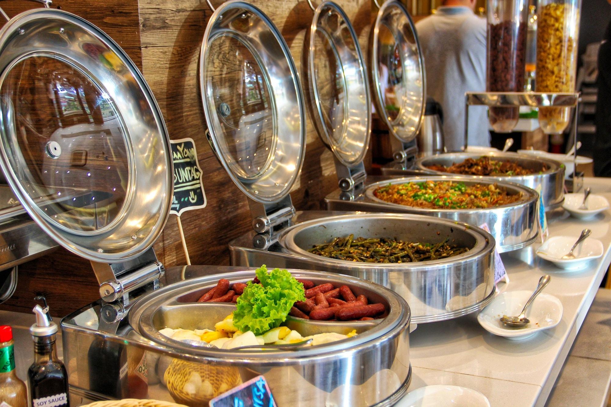 Restaurant New Dawn Hotel Plus