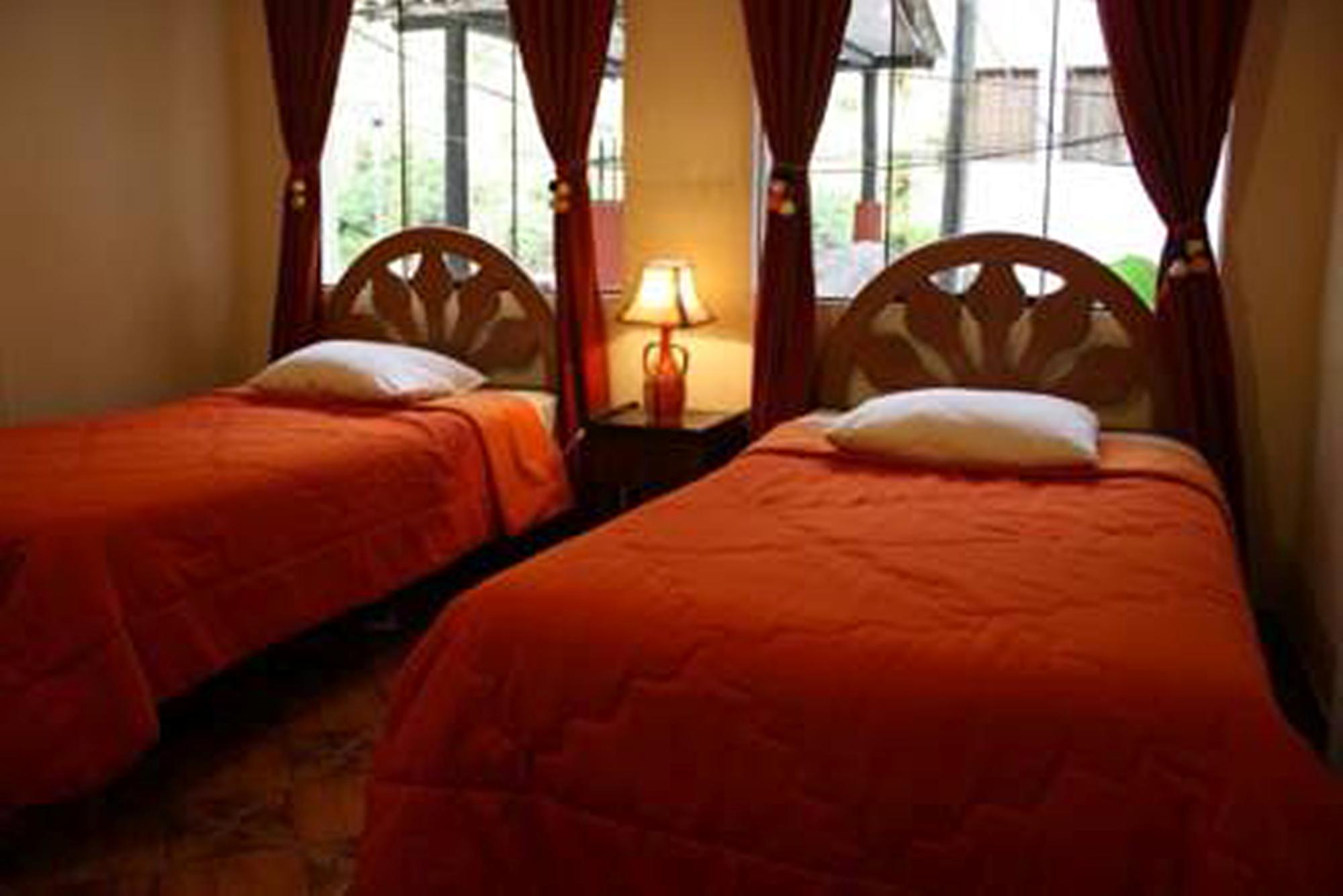 Habitación Golden House Inn