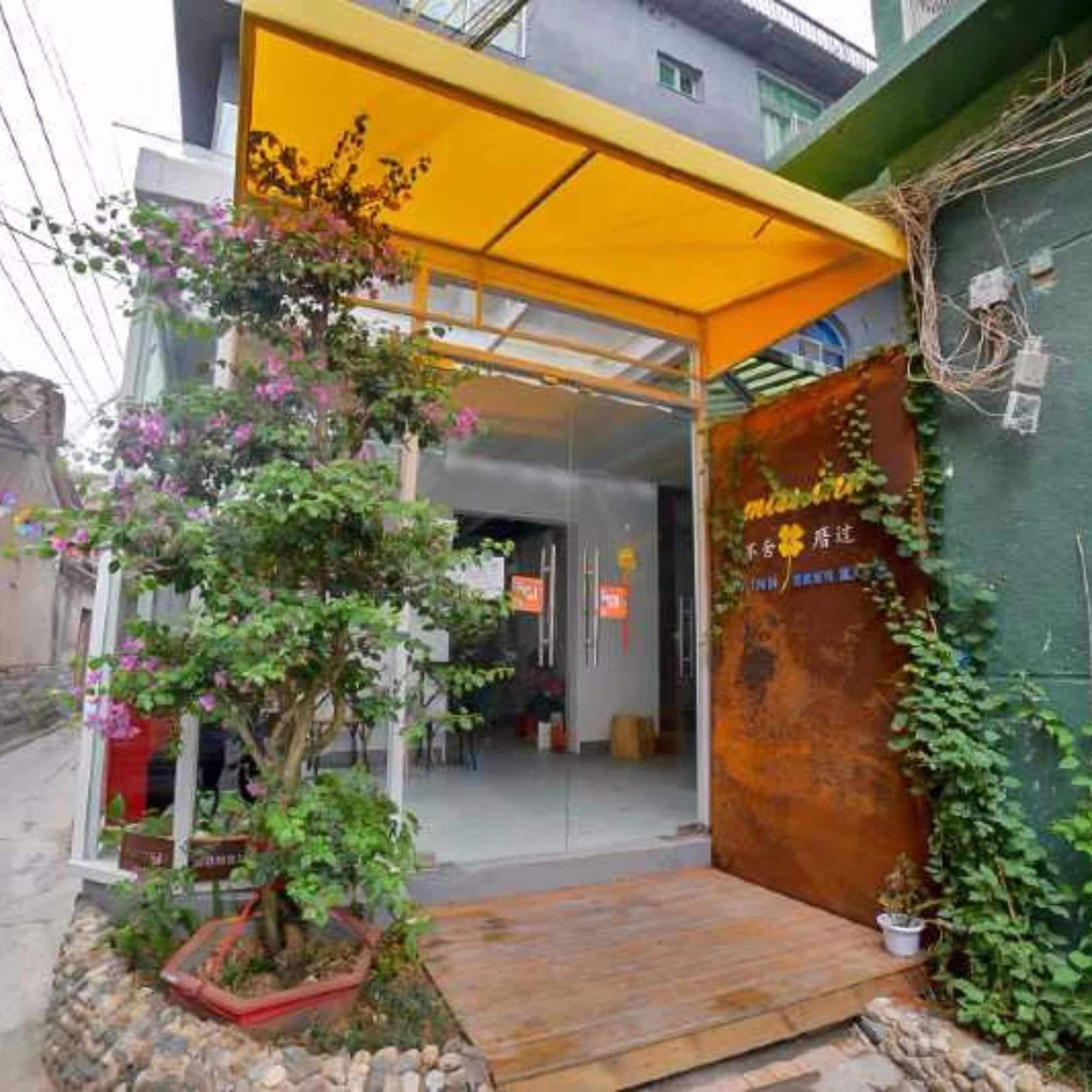 Vista Exterior Bushe Cuoguo Inn