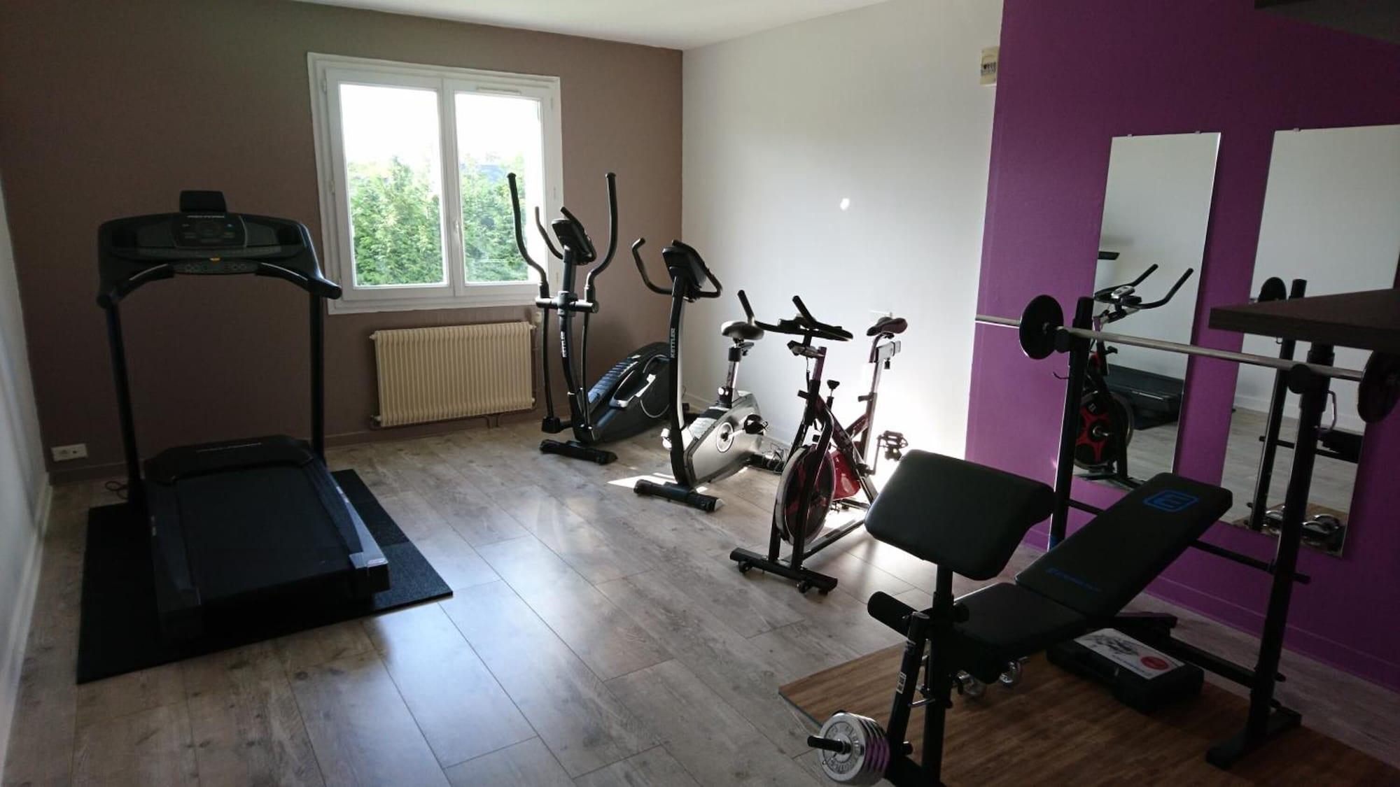 Gimnasio Cozy Hotel