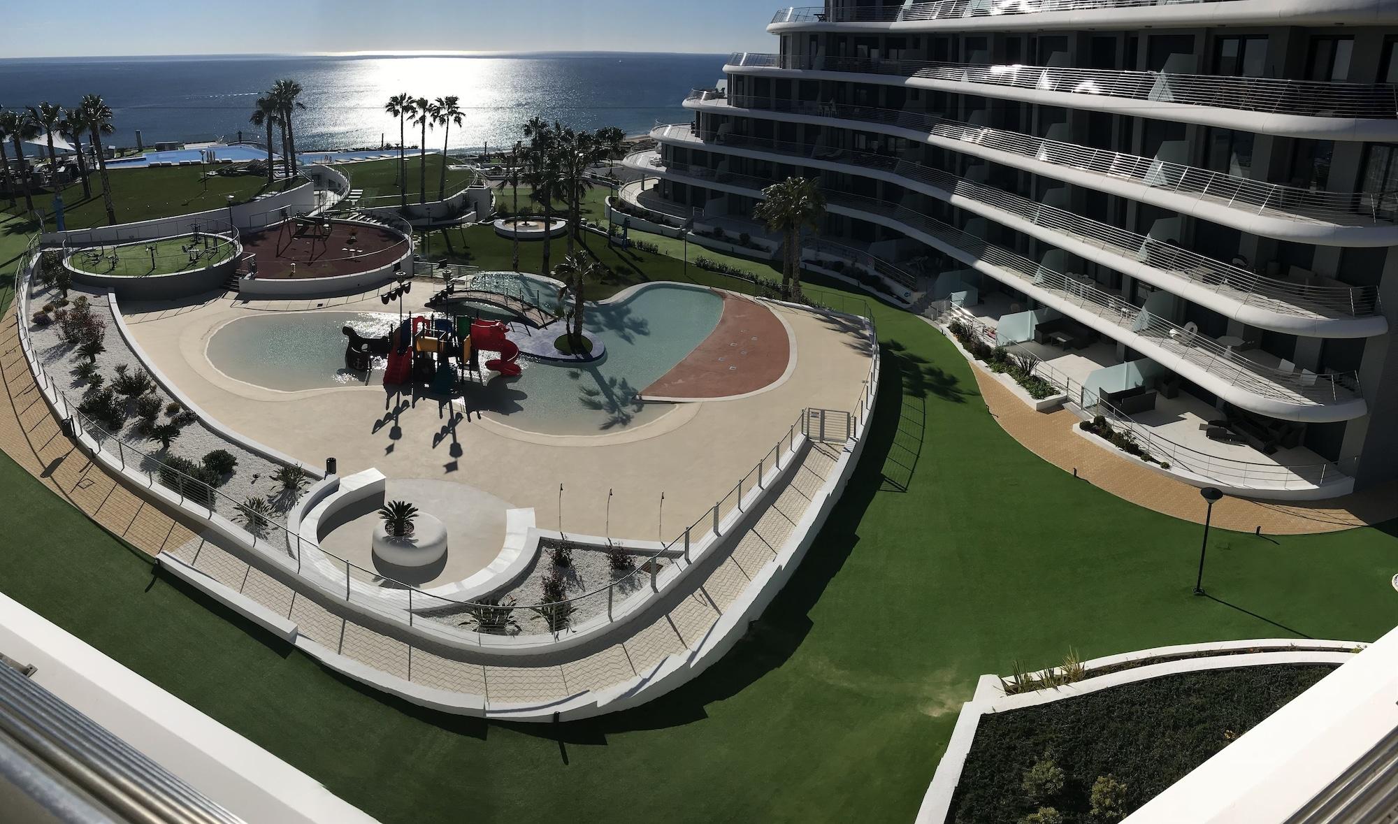 Vista Exterior Deluxe Apartment Arenales del Sol Beach